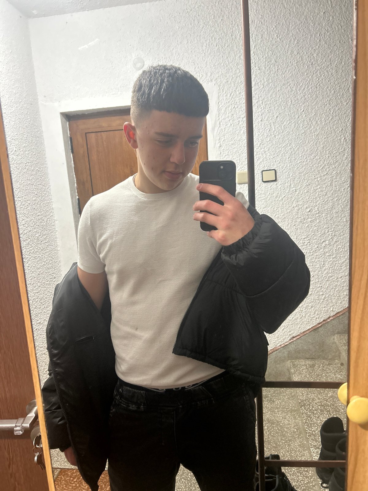Young man takes mirror selfie in Zlatograd, Bulgaria
