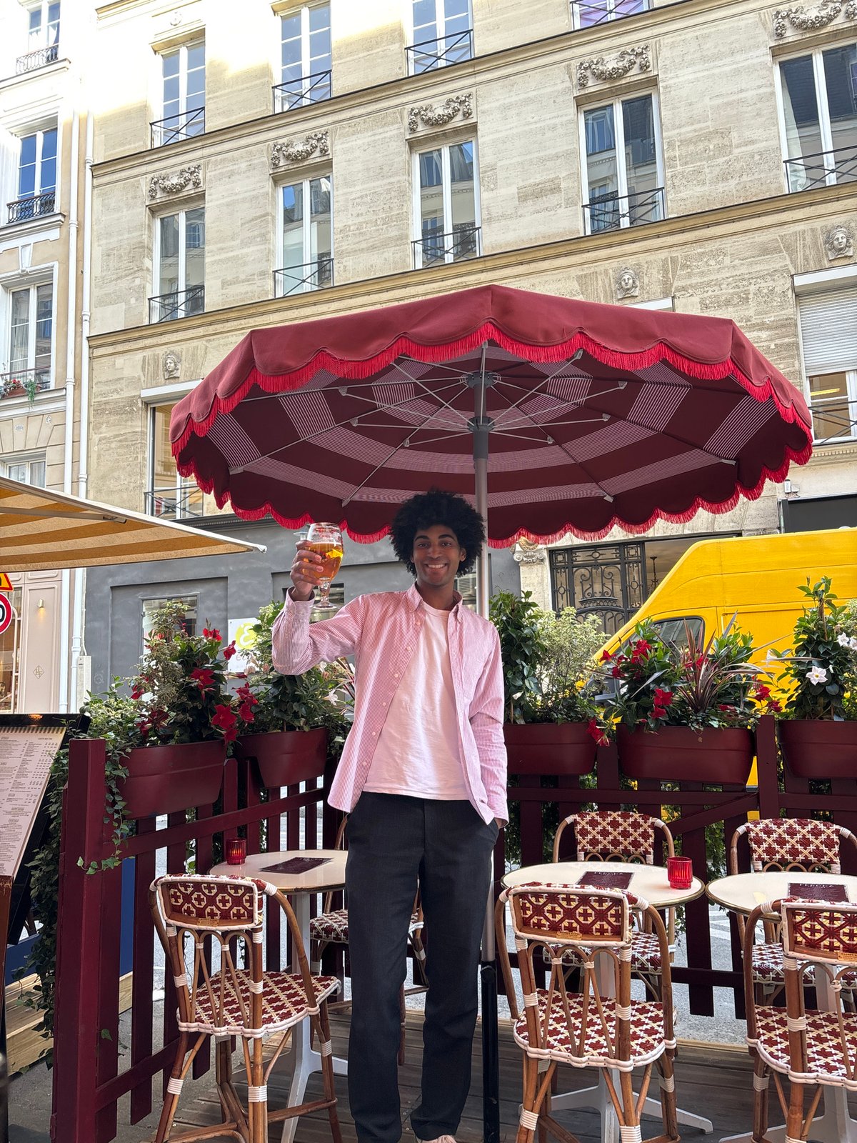 Afternoon drinks at Paris outdoor cafe on sunny day