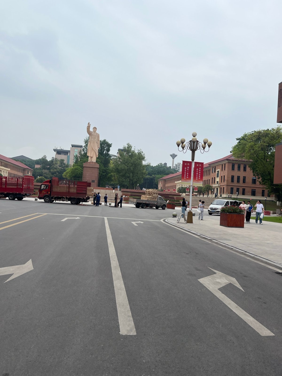 Road with flower planters observed in Yuzhong District