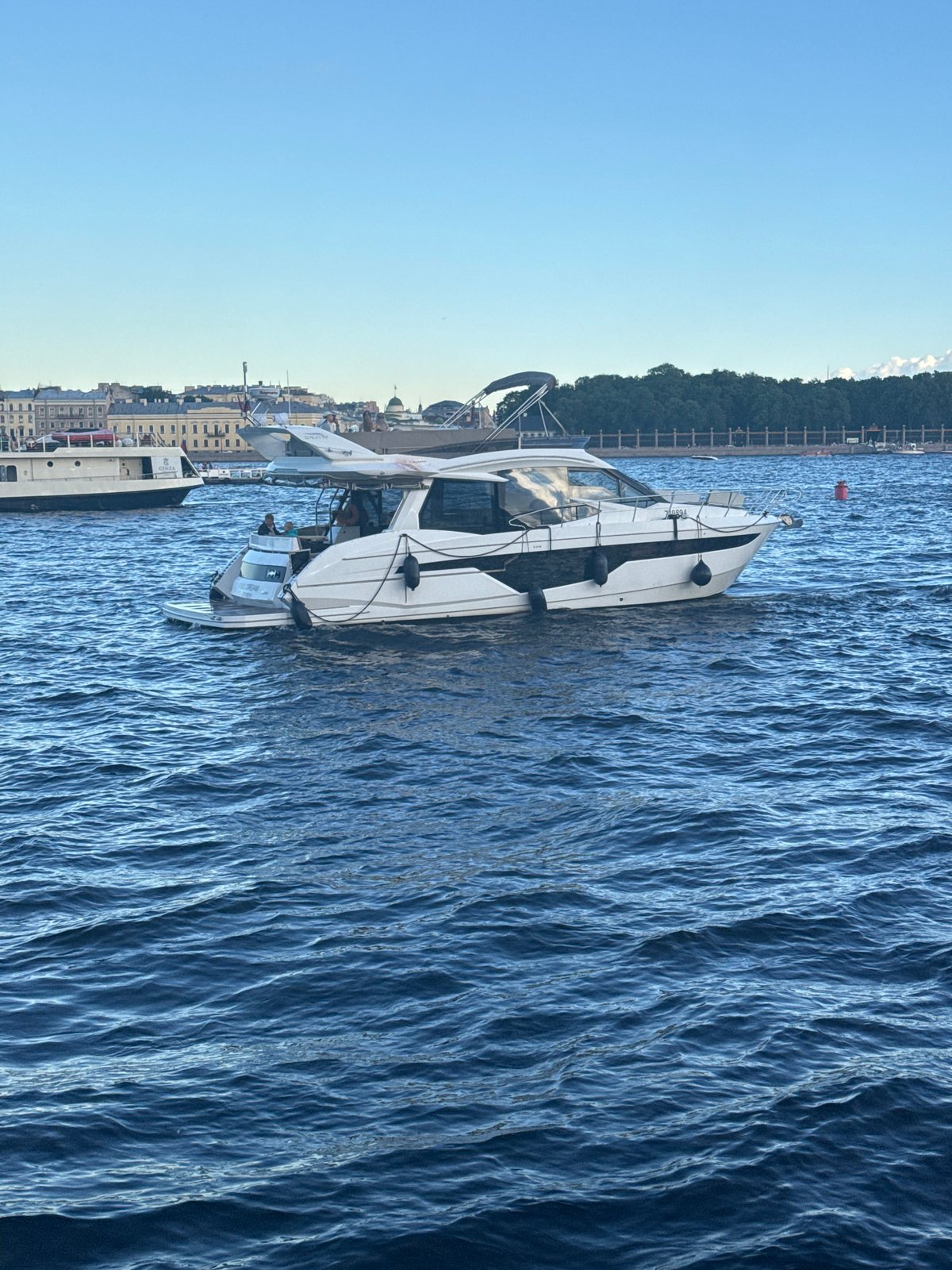 Sunny afternoon along the Neva with the Aurora cruiser