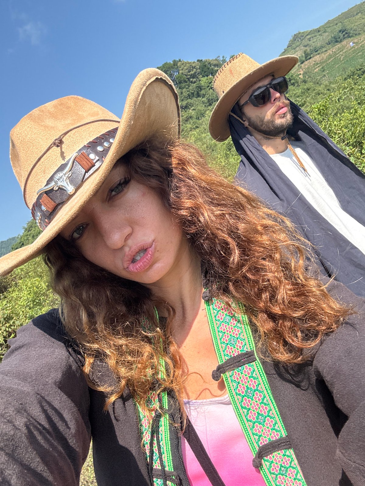 Couple photographs with decorated horse in Bắc Hà countryside