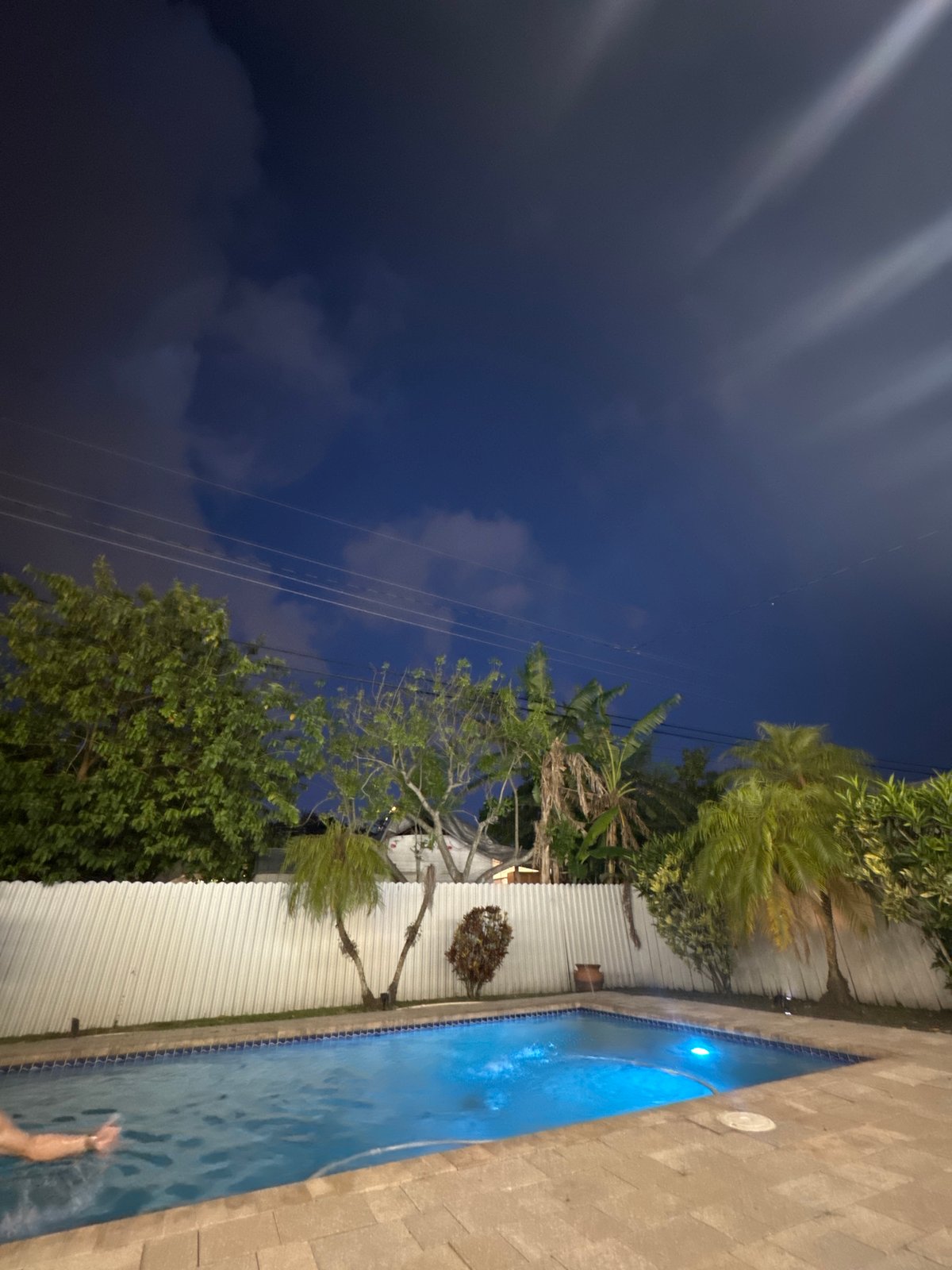 Miami residential pool area captured during late night hours