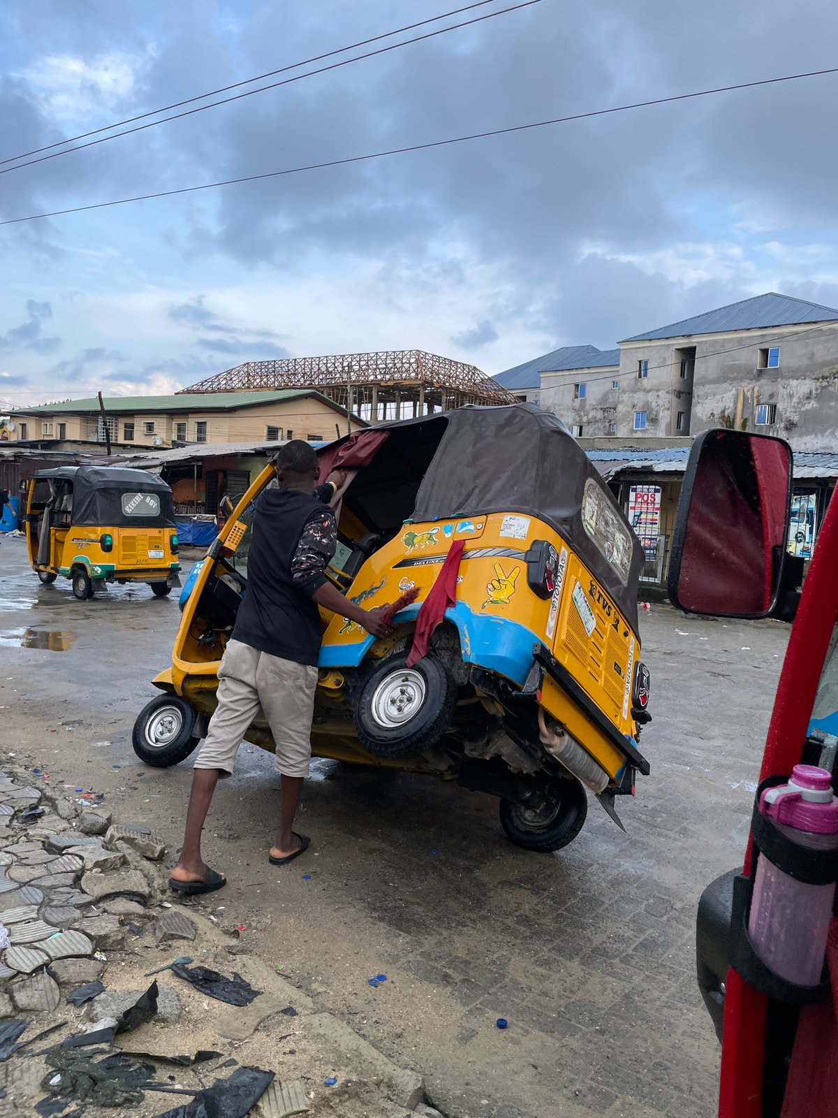 Morning street documentation in rainy Ado, Nigeria