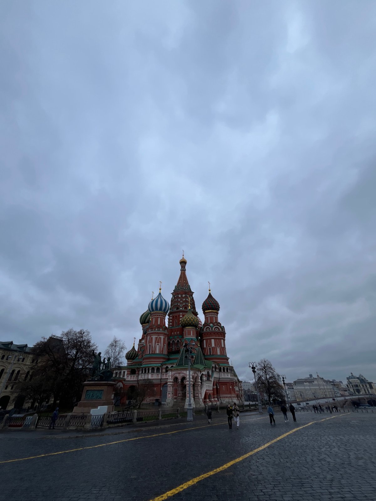 Tourist captures Red Square landmarks during Moscow afternoon visit
