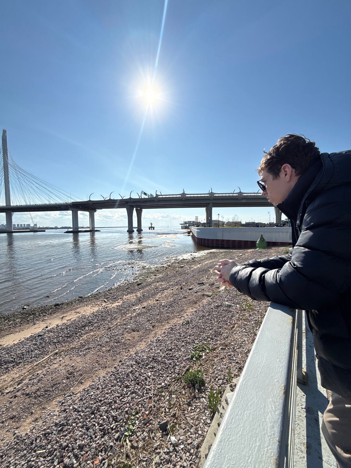Waterfront activity observed near Saint Petersburg bridge, helicopter spotted
