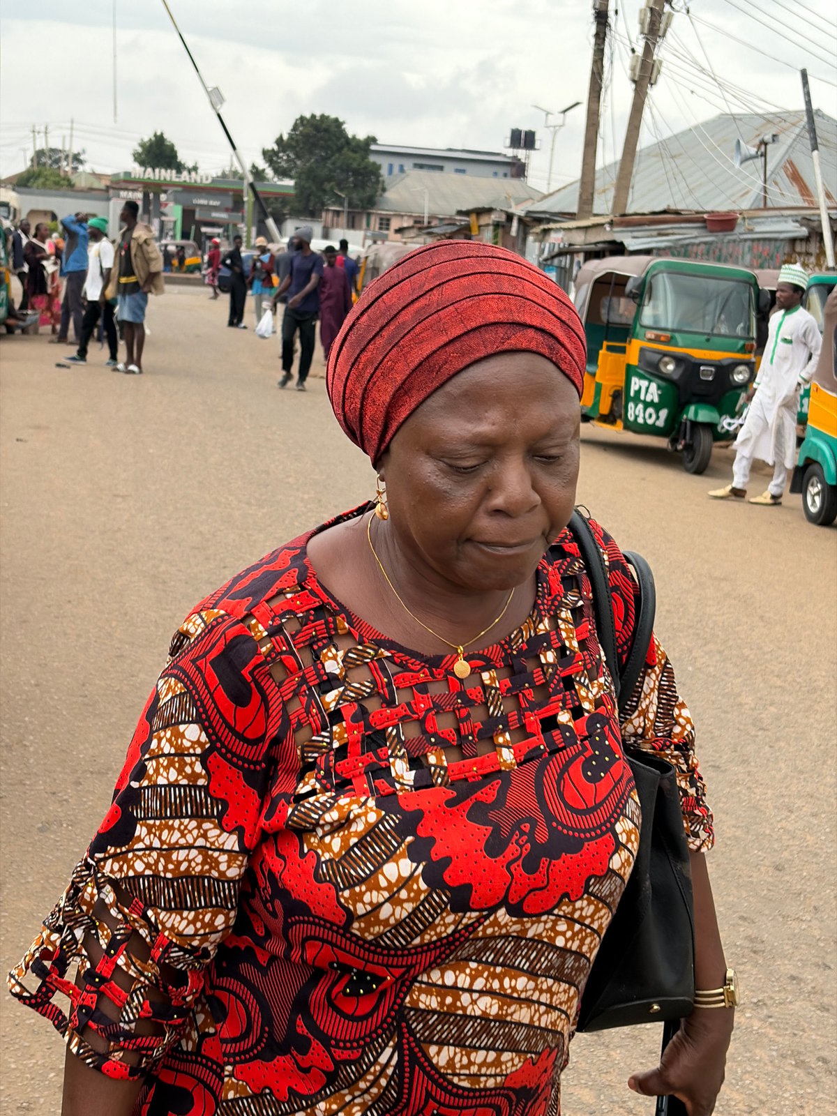 Morning street life and basketball game documented in Nigerian communities