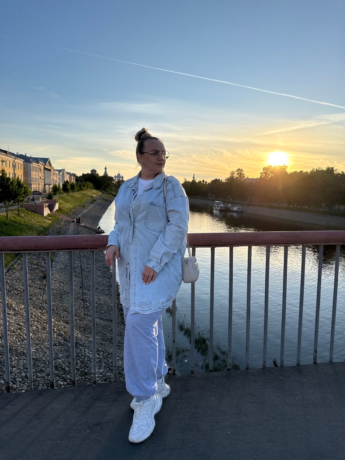Evening riverside stroll documented along Vologda River waterfront