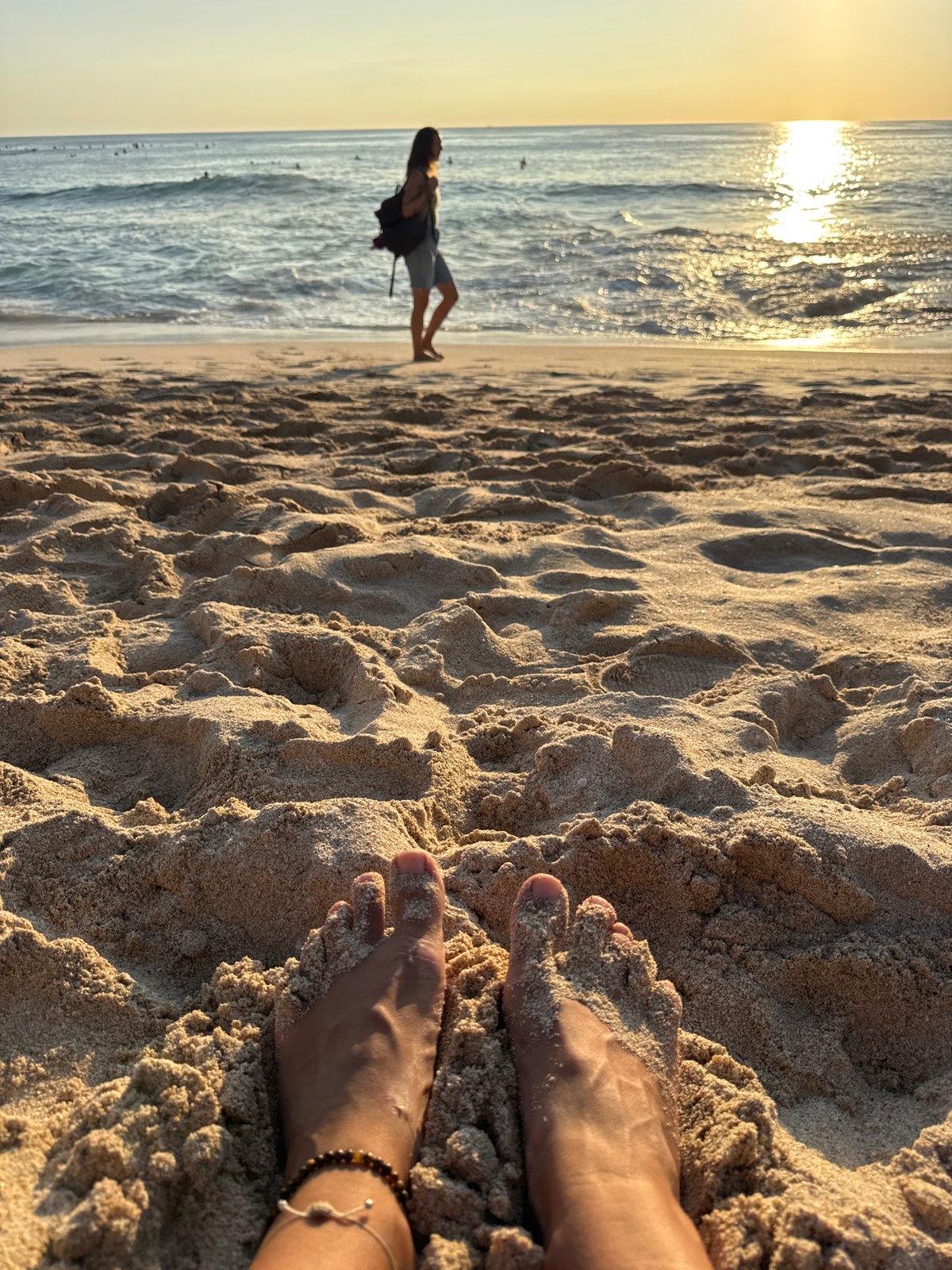 Morning beach life unfolds in Kuta Selatan, Indonesia