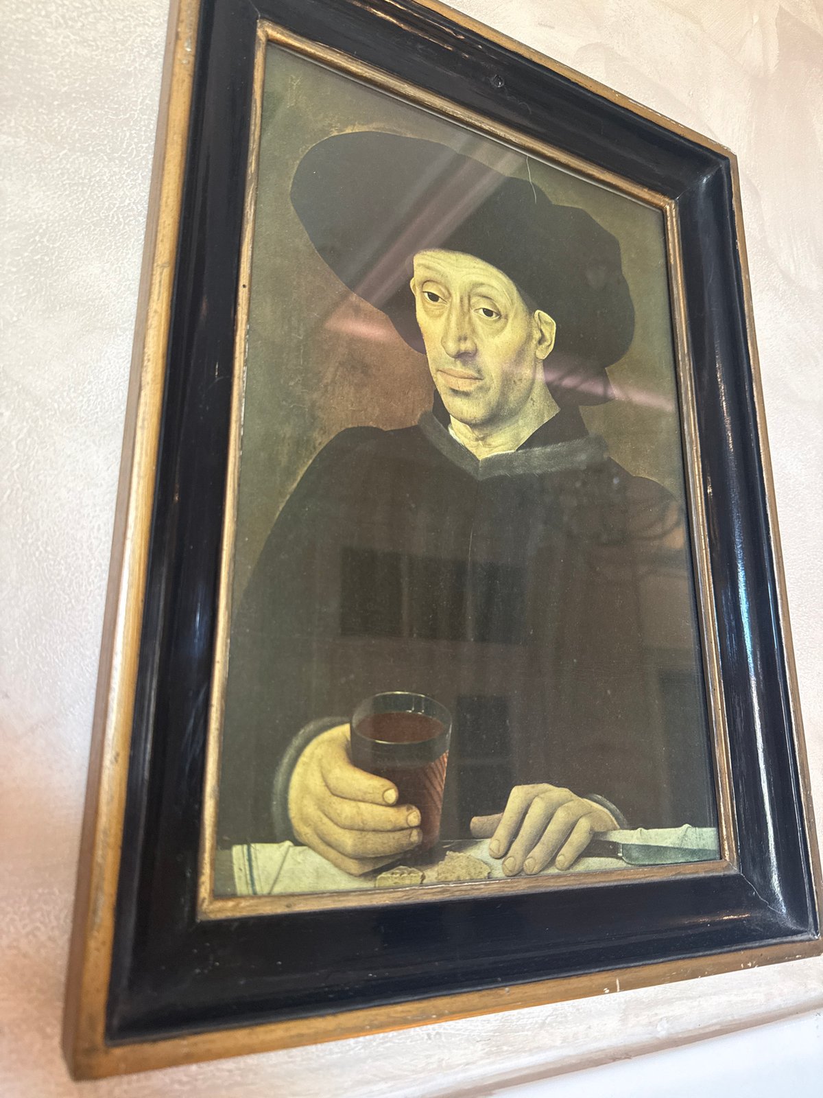Framed painting of man with cup documented in Razgrad