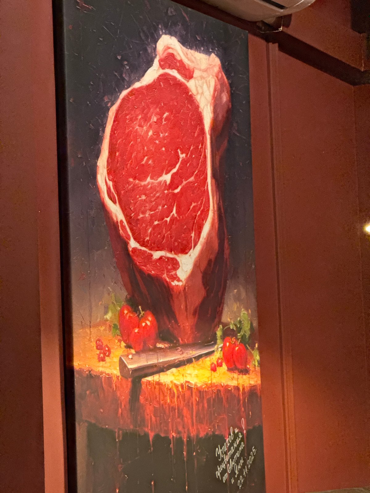 Interior scenes documented at Izhevsk gastropub featuring art and photographs