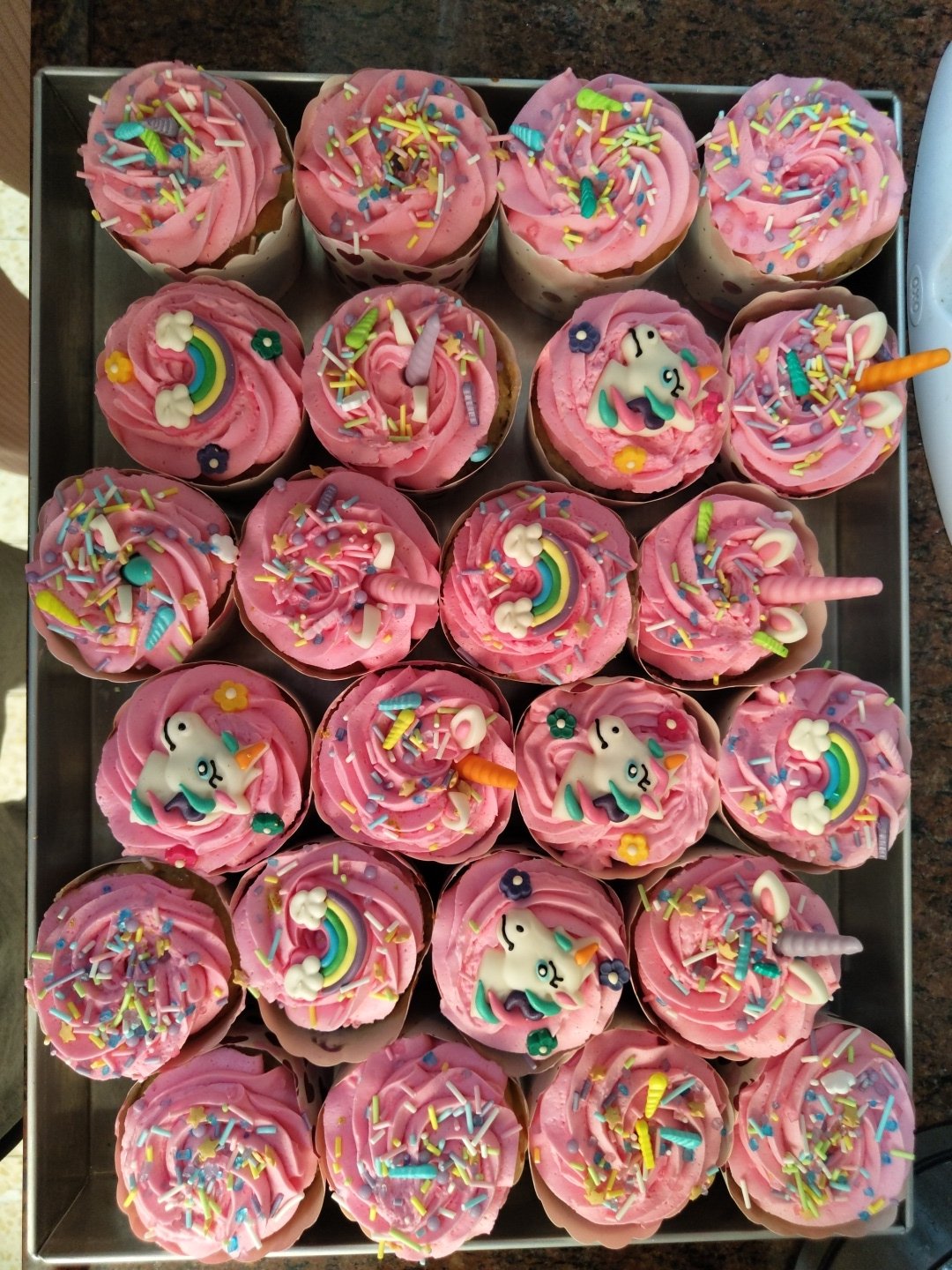 Decorated unicorn cupcakes displayed at Tel Aviv bakery