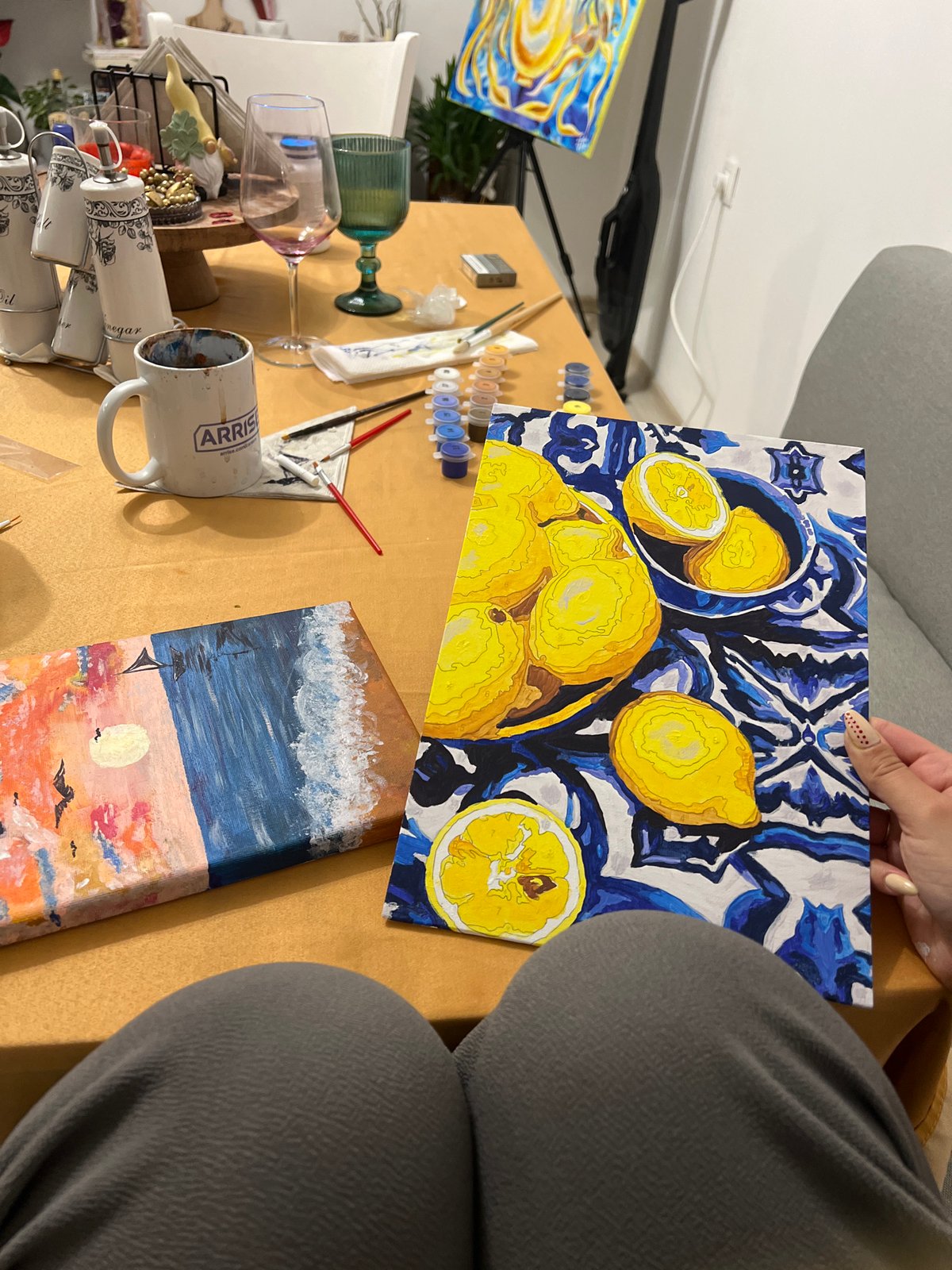Artist displays lemon painting indoors in Smolyan, Bulgaria