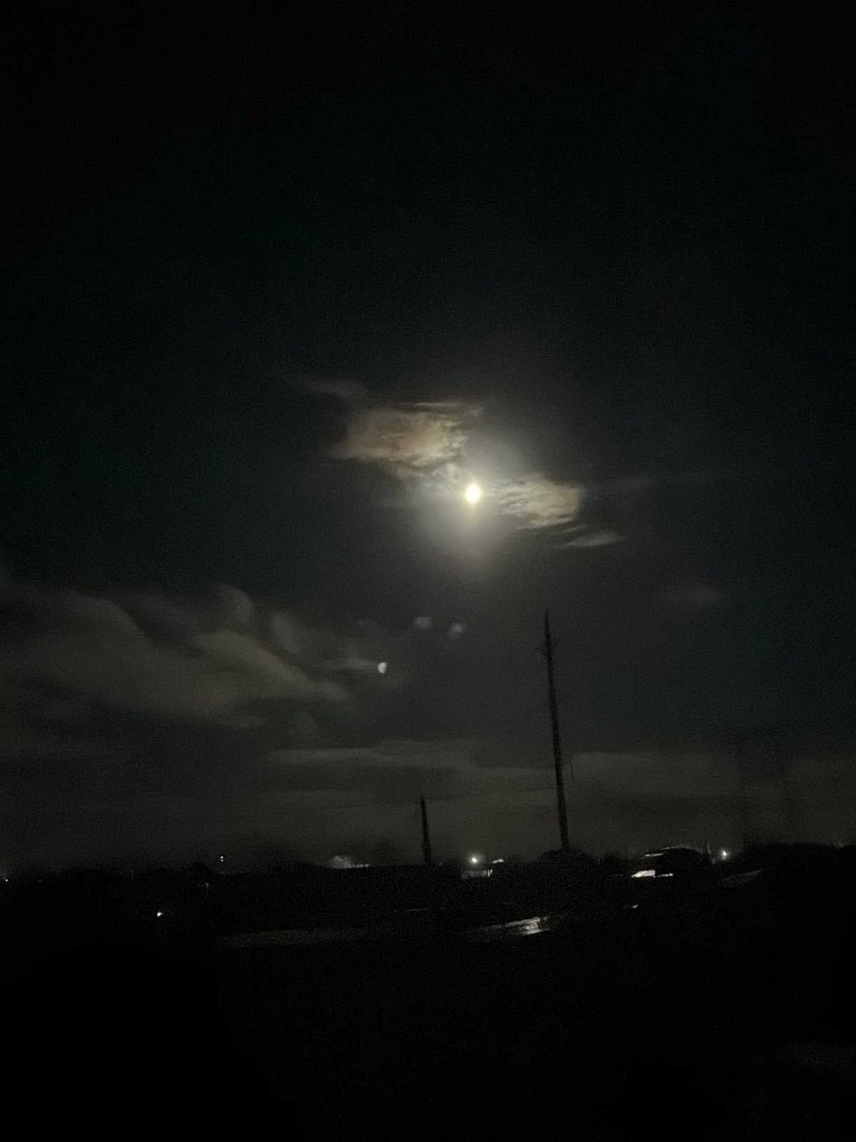 Night scene captured on illuminated street in Chaikovsky, Russia