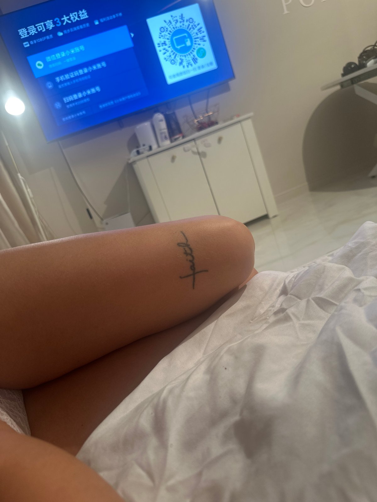 Person photographed resting indoors in Moscow apartment setting