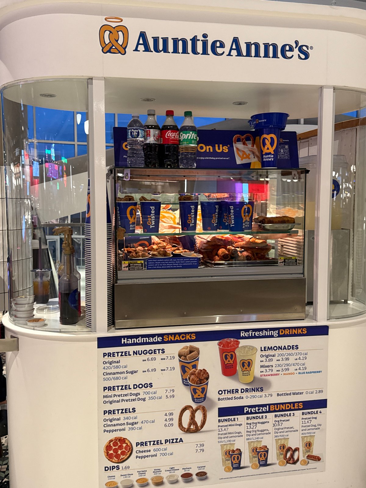 Empty Auntie Anne's pretzel stand observed in mall setting