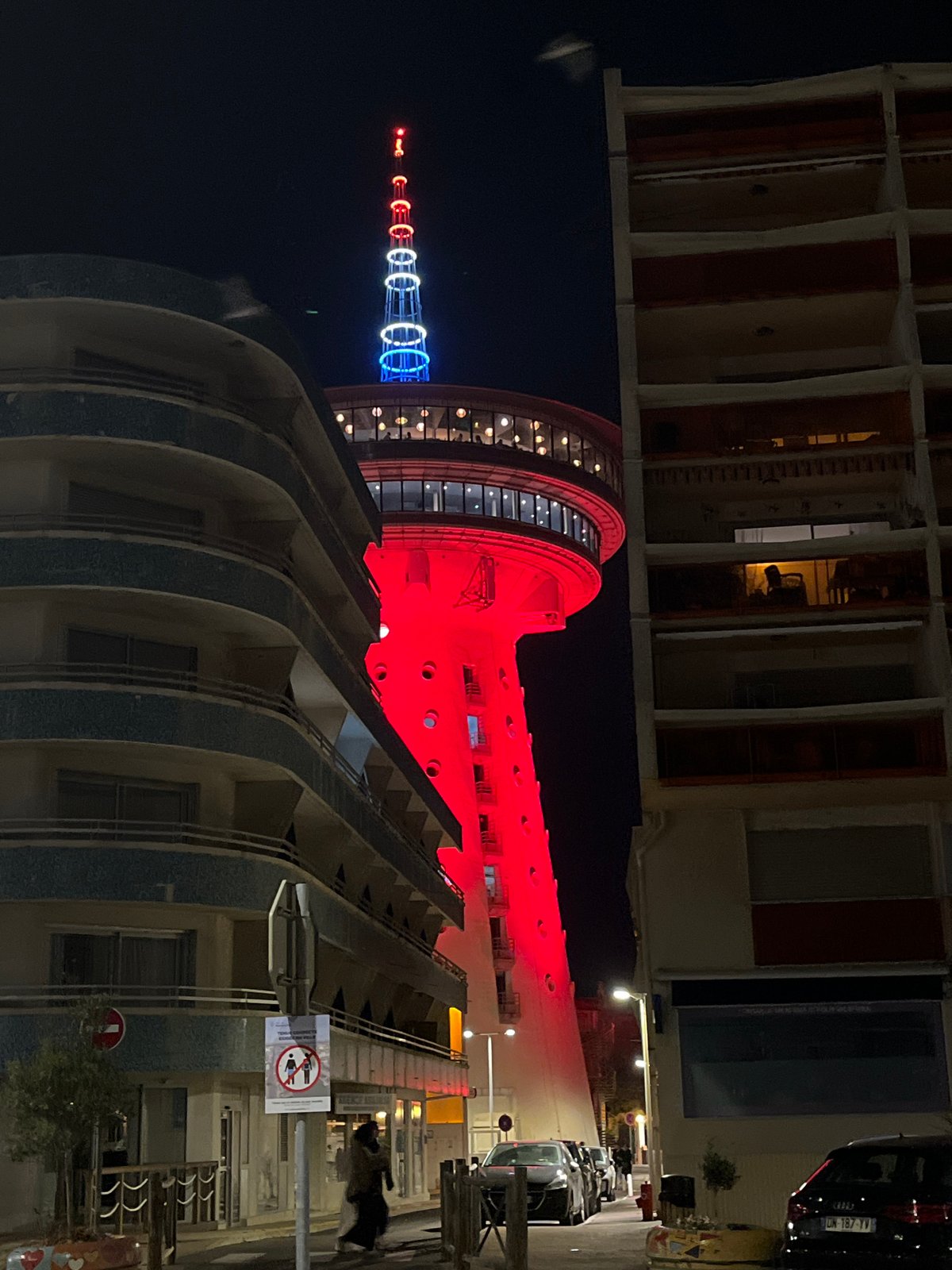 Mediterranean lighthouse tower illuminated in Palavas-les-Flots night scene