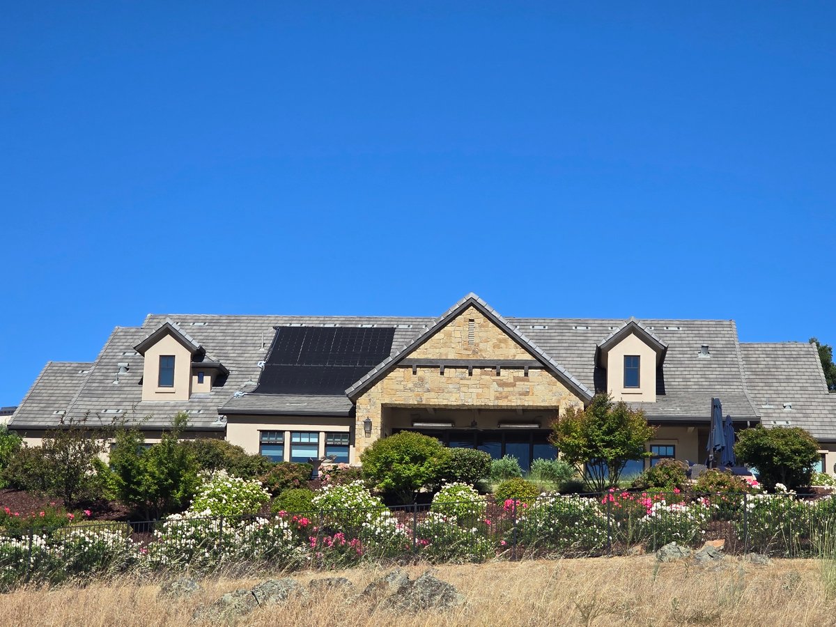 Upscale residential exteriors surveyed on a sunny afternoon