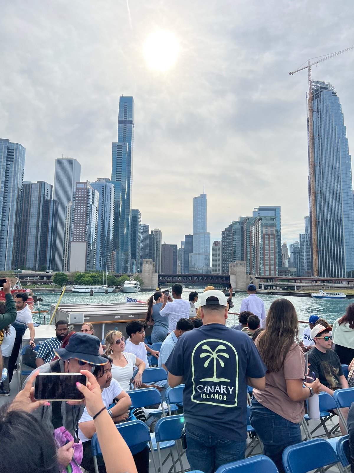 Chicago River boat captures overcast skyline view