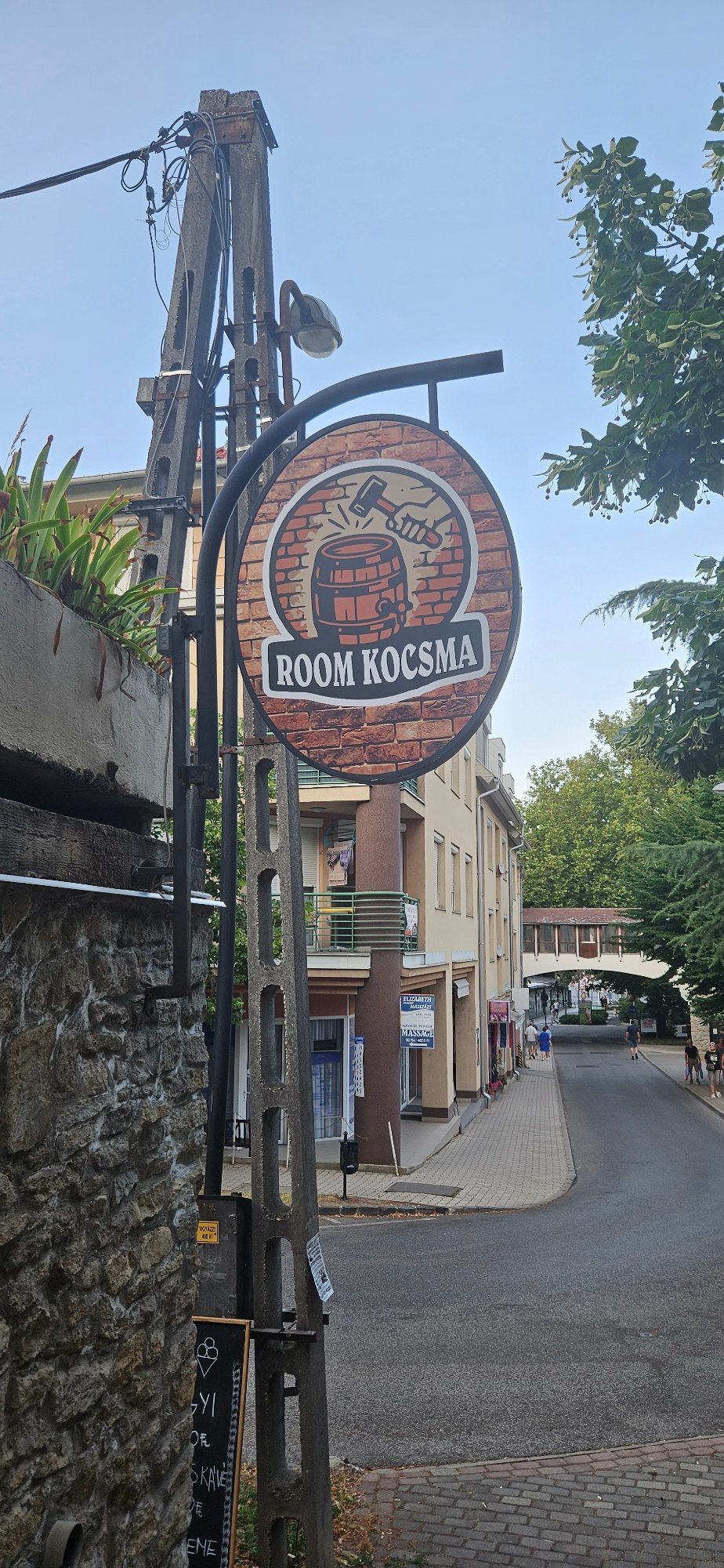 Summer evening stroll through Hévíz's lit-up pedestrian shopping strip