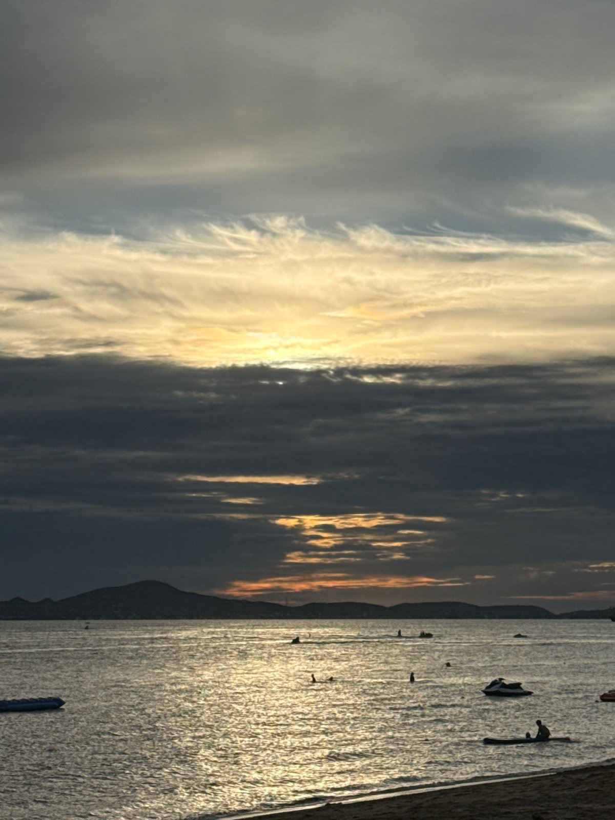 Beach day in Pattaya: watersports, shoreline views, and local color