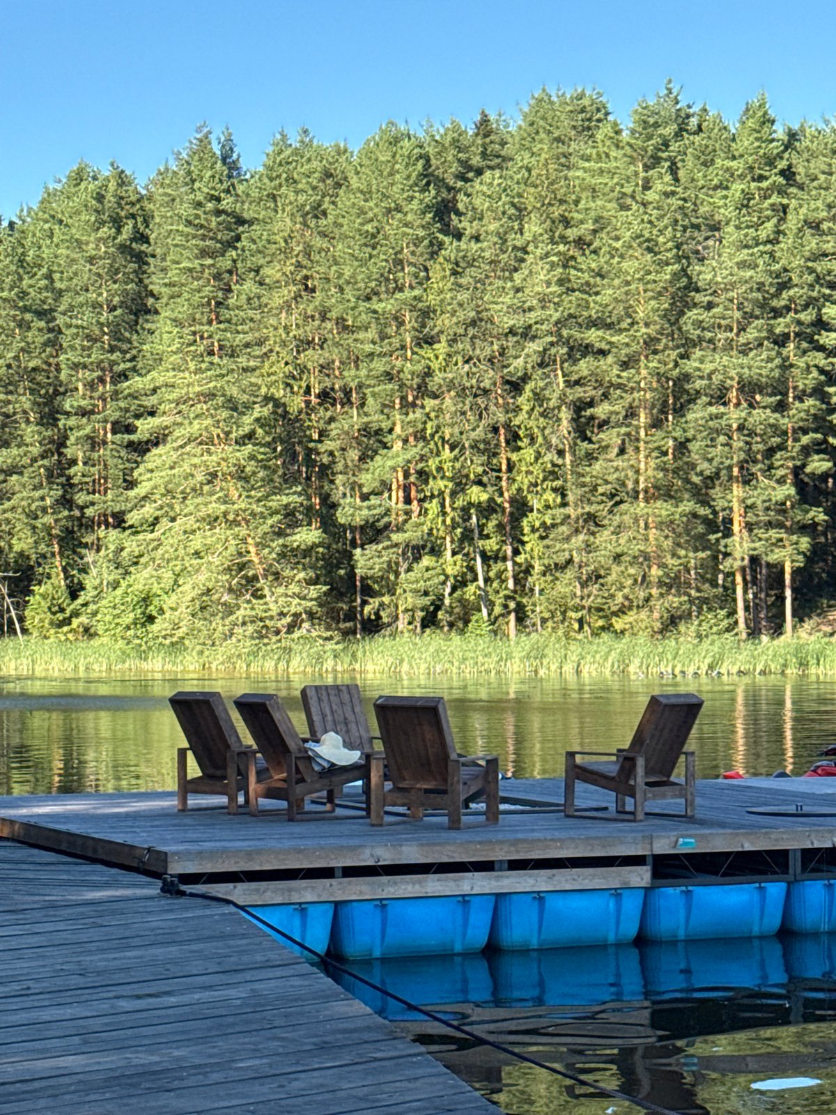 Lakeside cabin retreat on the Votkinsk Reservoir, summer afternoon