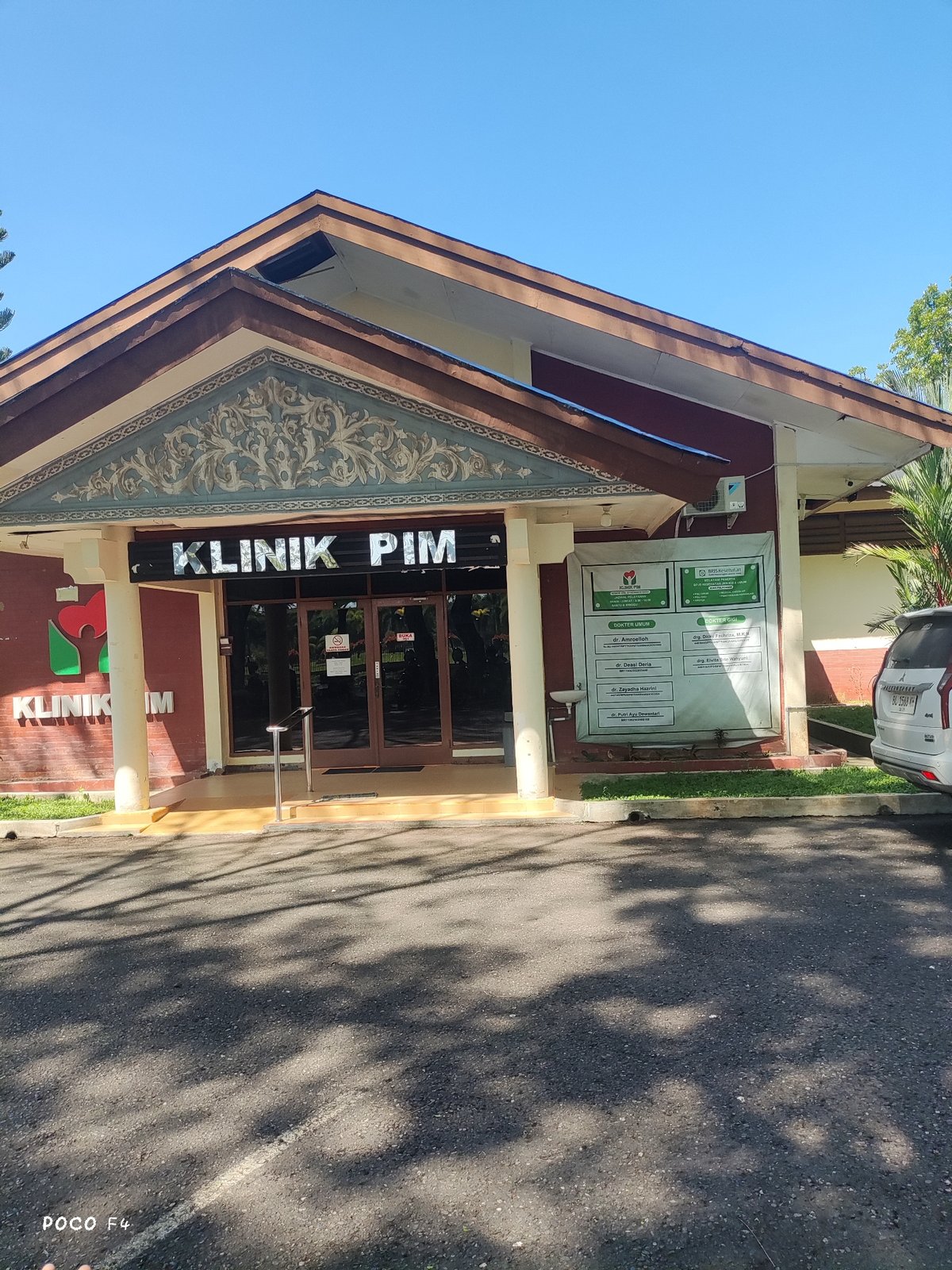 Inside and outside Klinik PIM, an Indonesian medical clinic