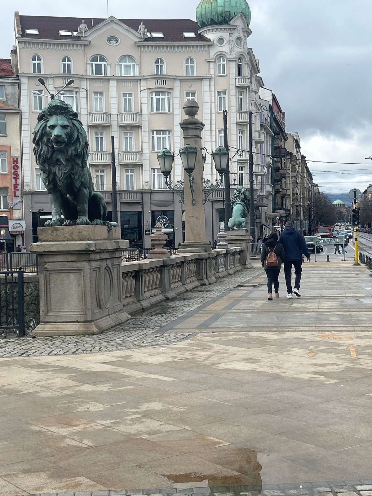 Morning pedestrians cross historic Lion Bridge in Sofia
