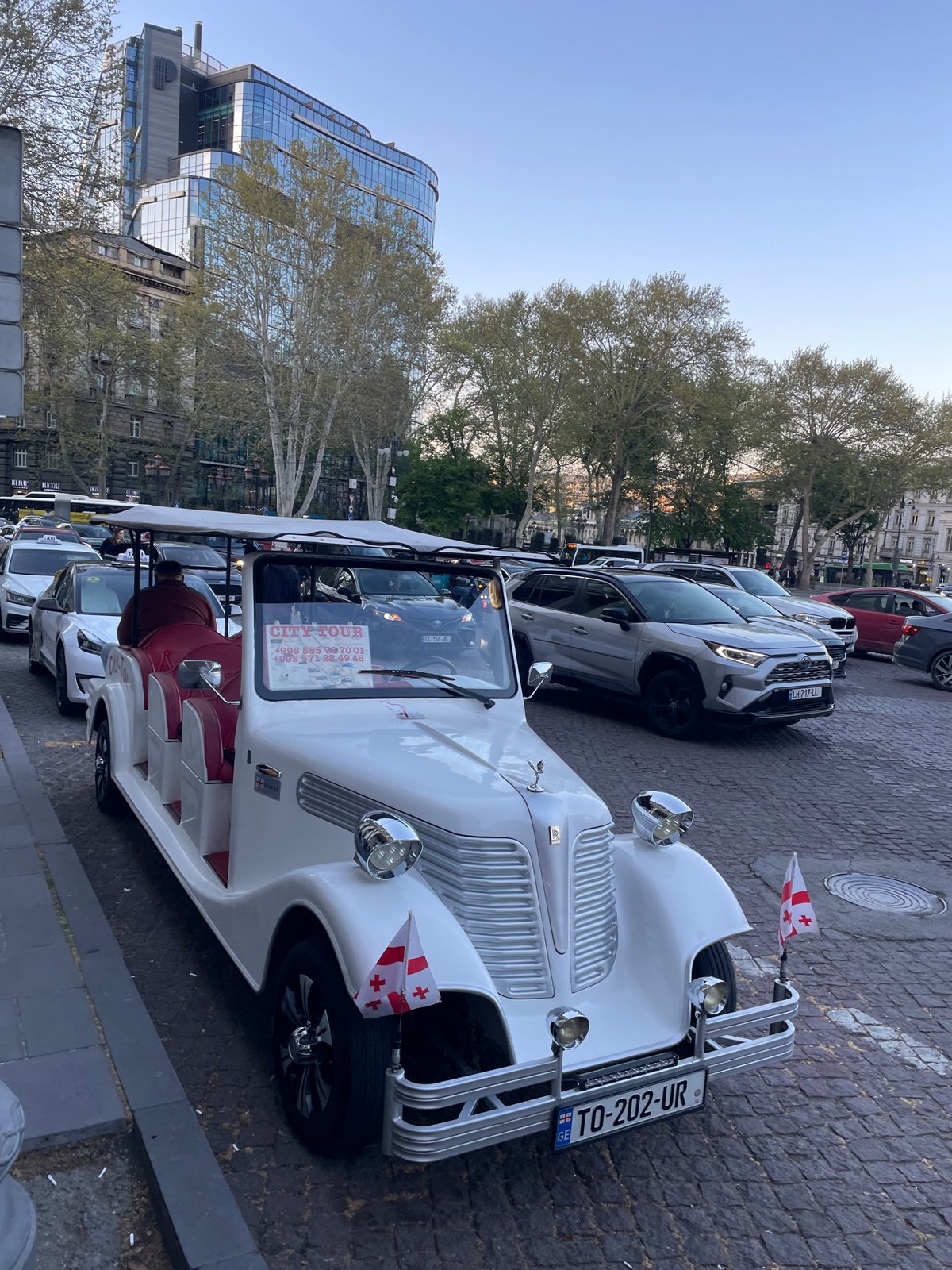 Tourist documents afternoon walk through historic Tbilisi streets