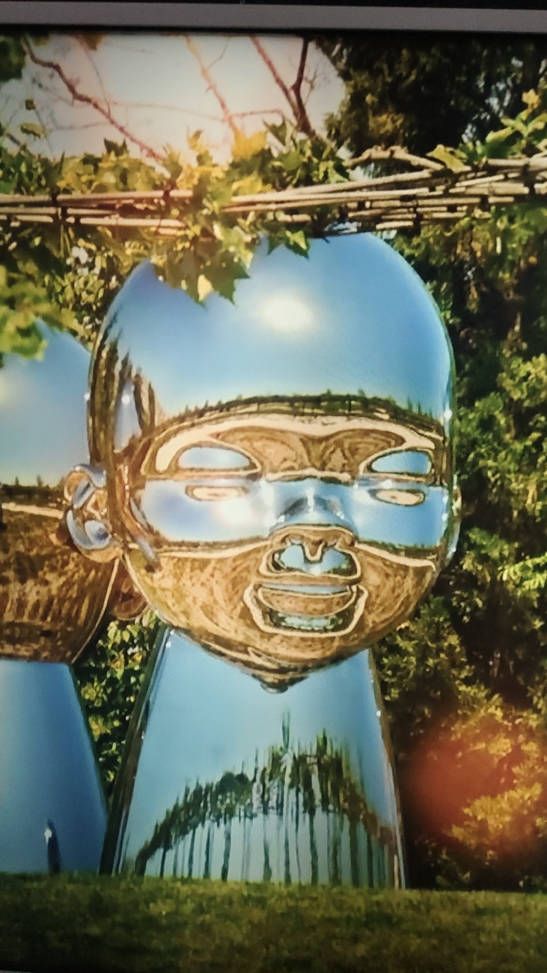 Silver baby sculpture reflects environment in Krasnoyarsk