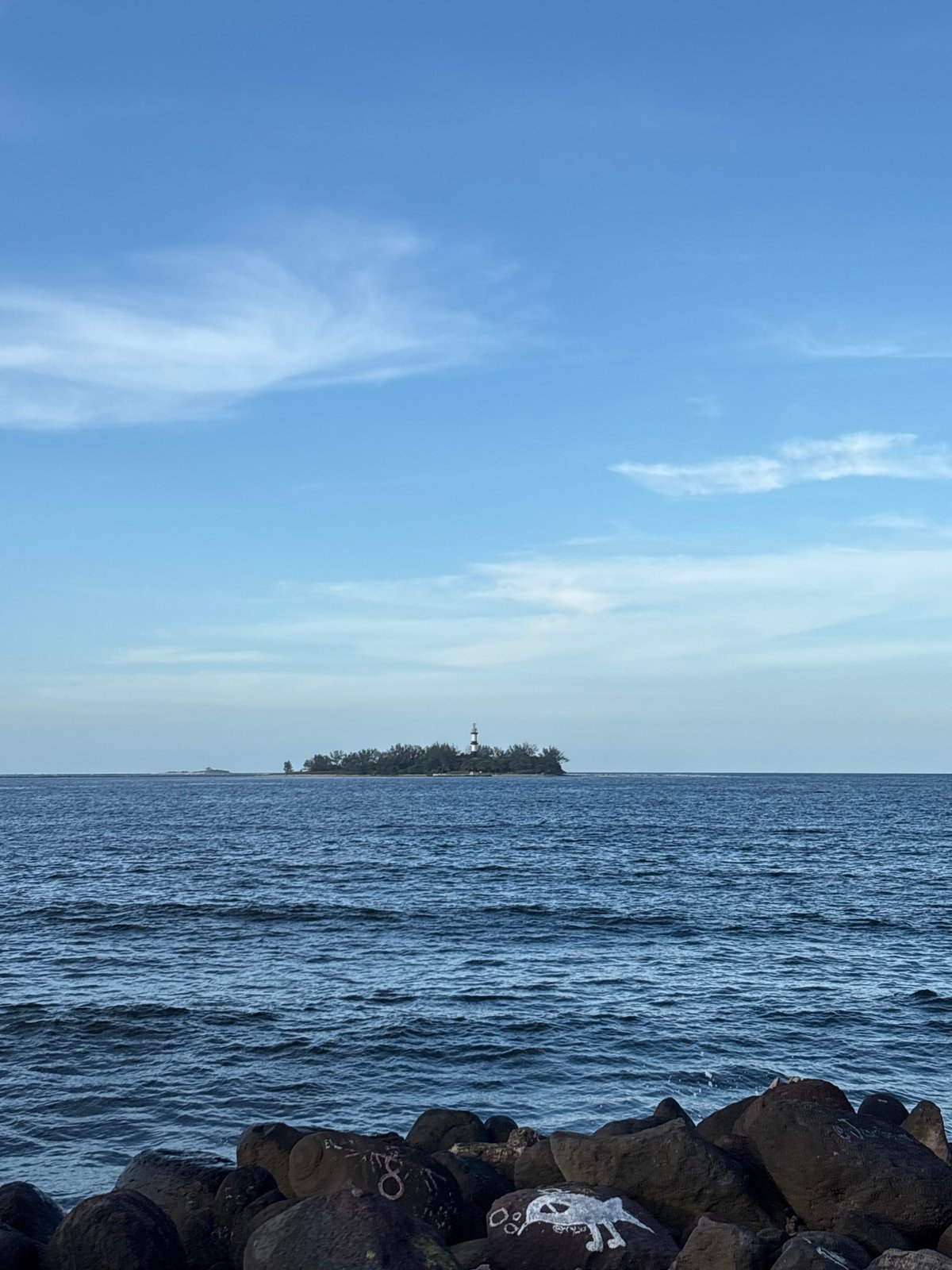Rocky Gulf coast view with lighthouse island off Veracruz
