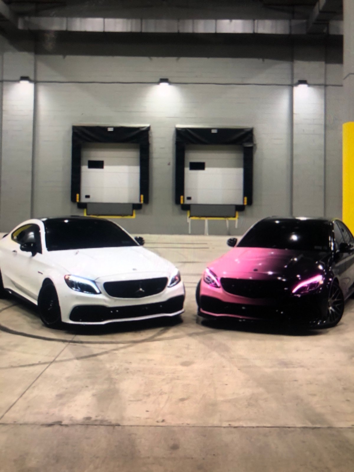 Two cars parked in indoor facility, Lhokseumawe Indonesia