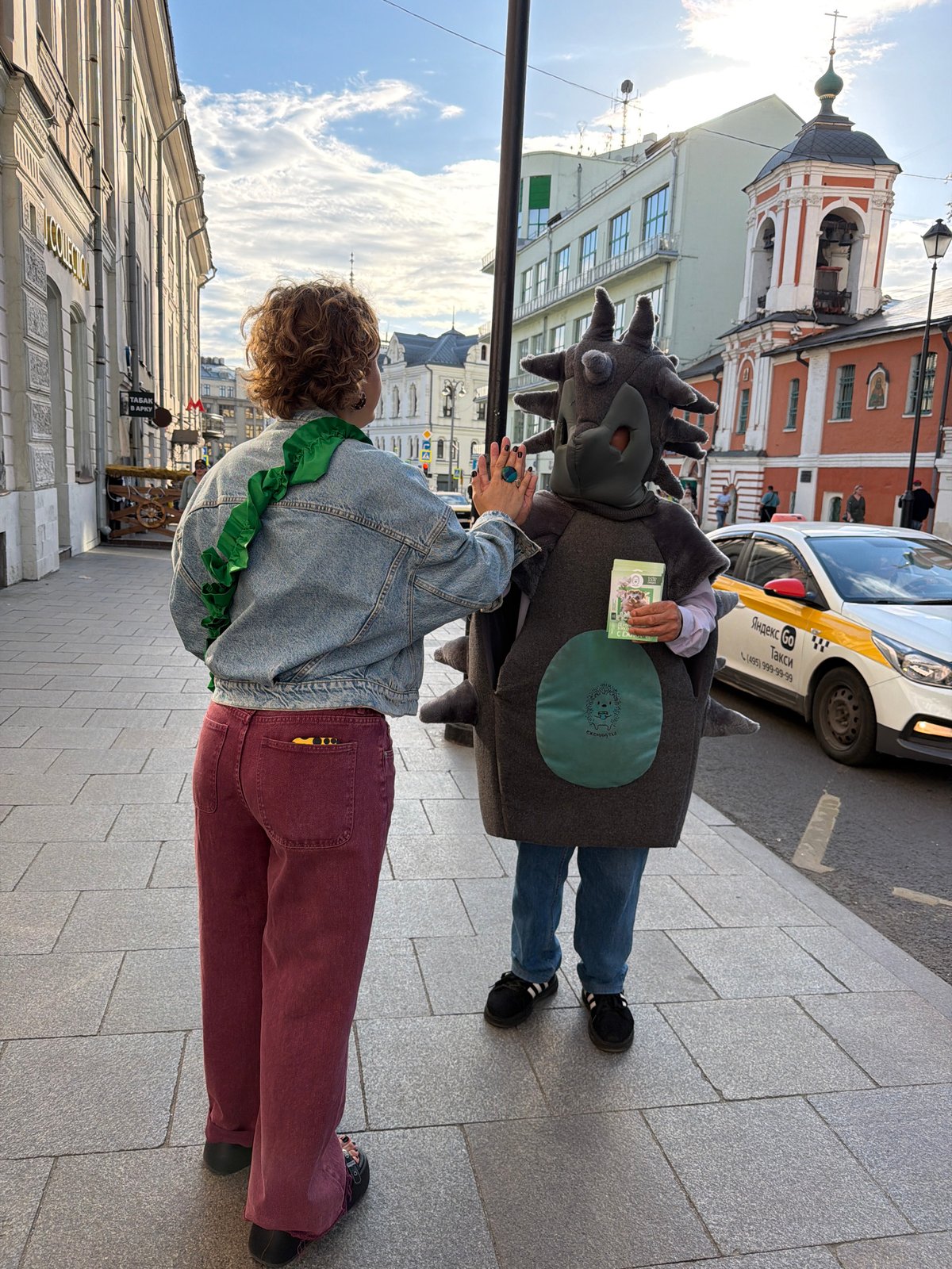 Hedgehog-costumed person spotted with cat food on Moscow street