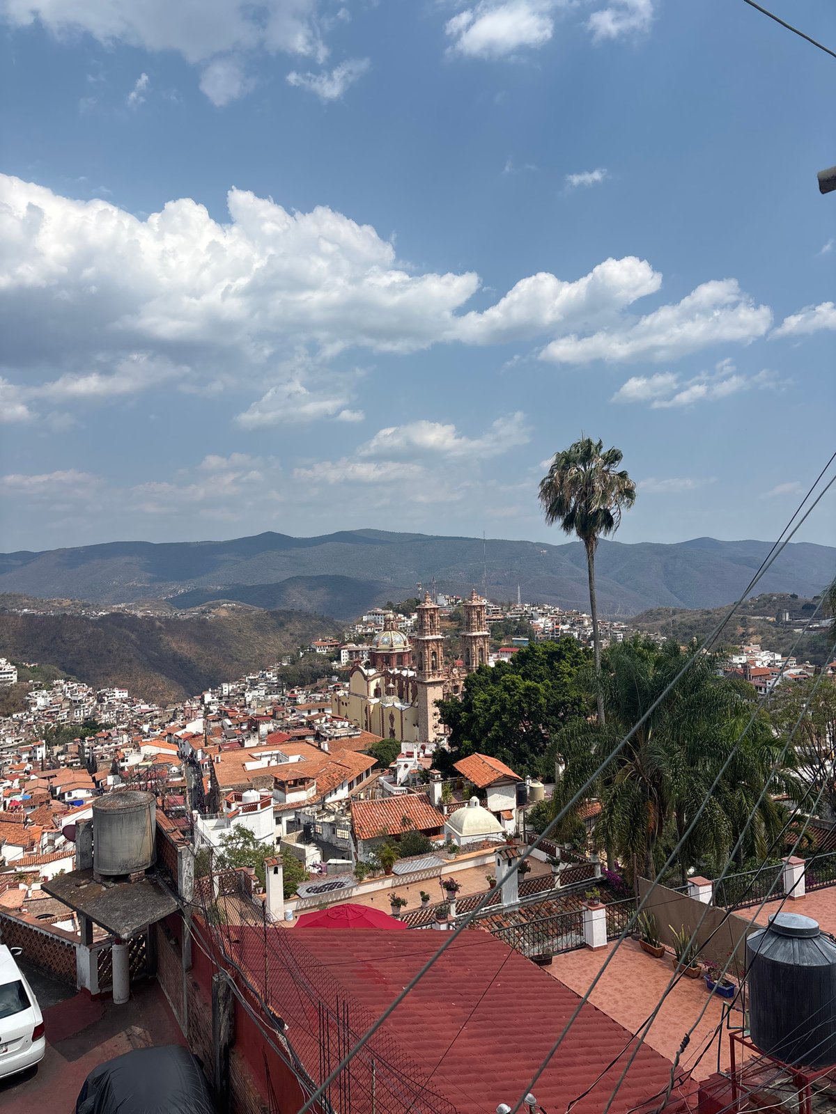 Elevated view captures Taxco's distinctive red-tiled colonial cityscape