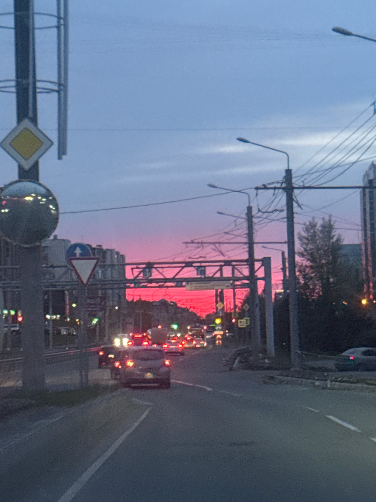 Pink sky captured over Krasnoyarsk street scene