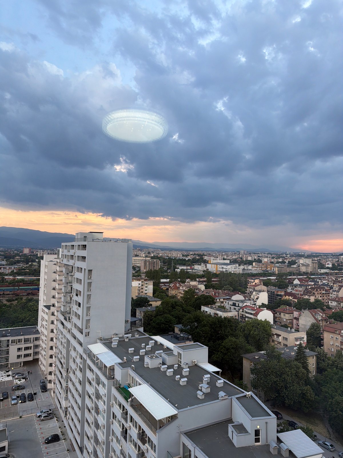Woman photographs outfit and cityscape in Plovdiv, Bulgaria