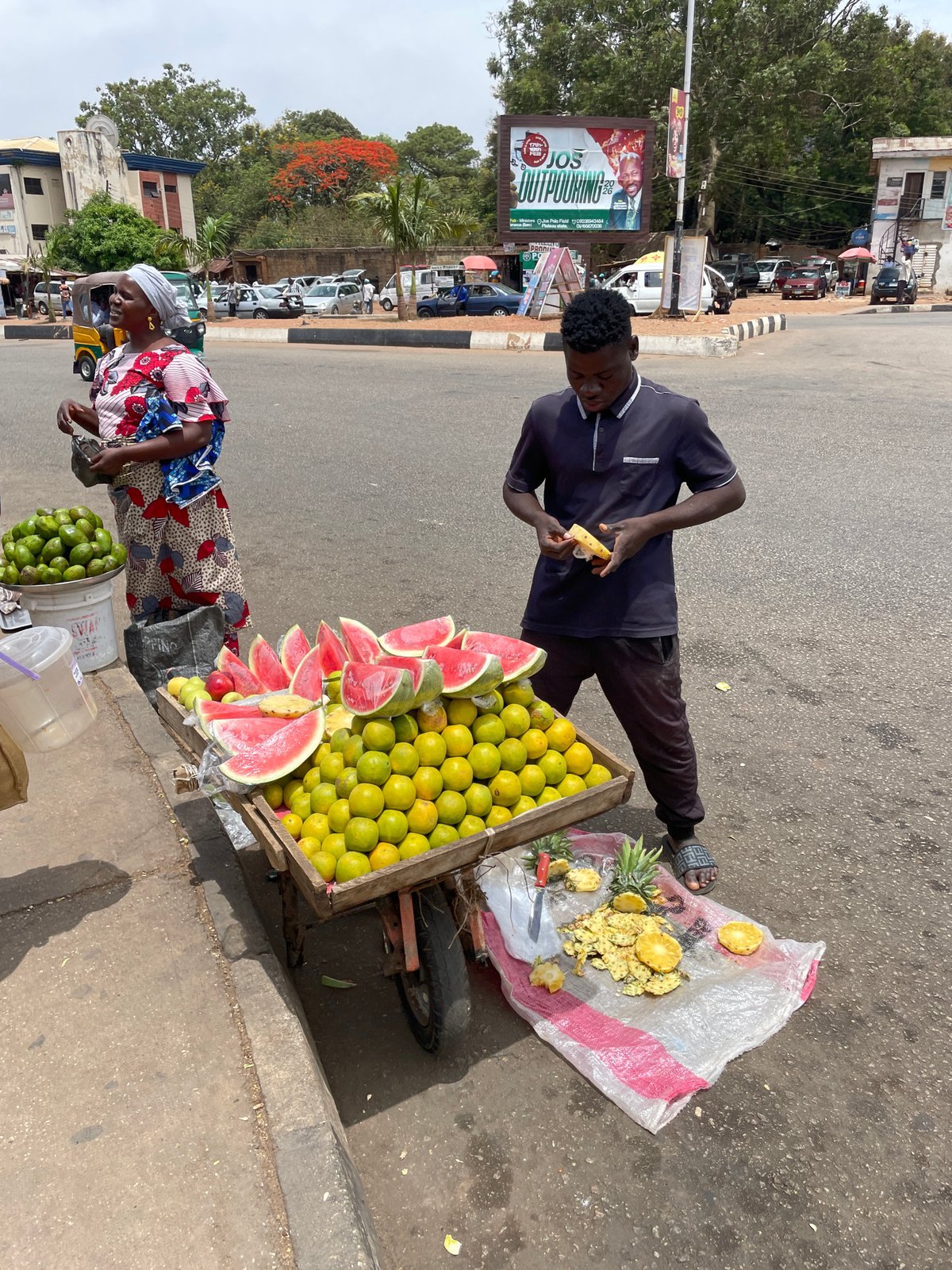 Street vendors sell fruit, food in Jos Nigeria