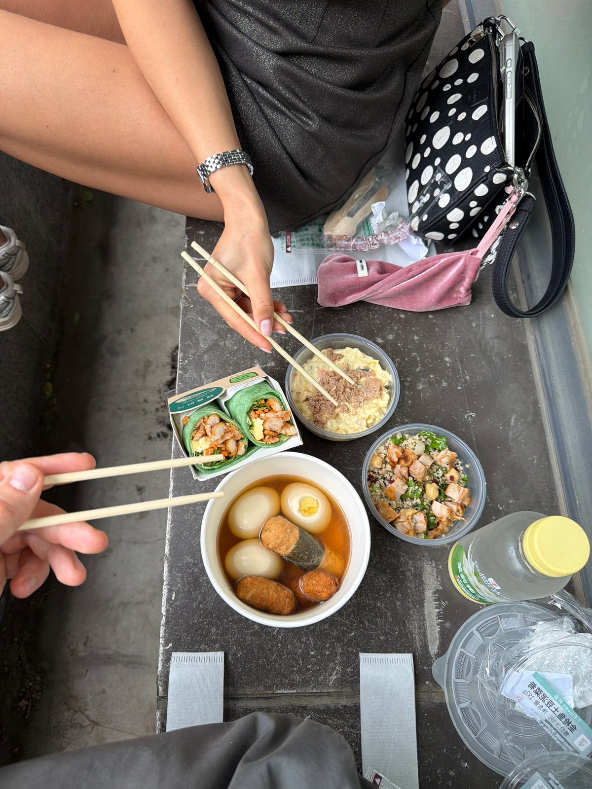 Two people share chopstick meal in Beijing
