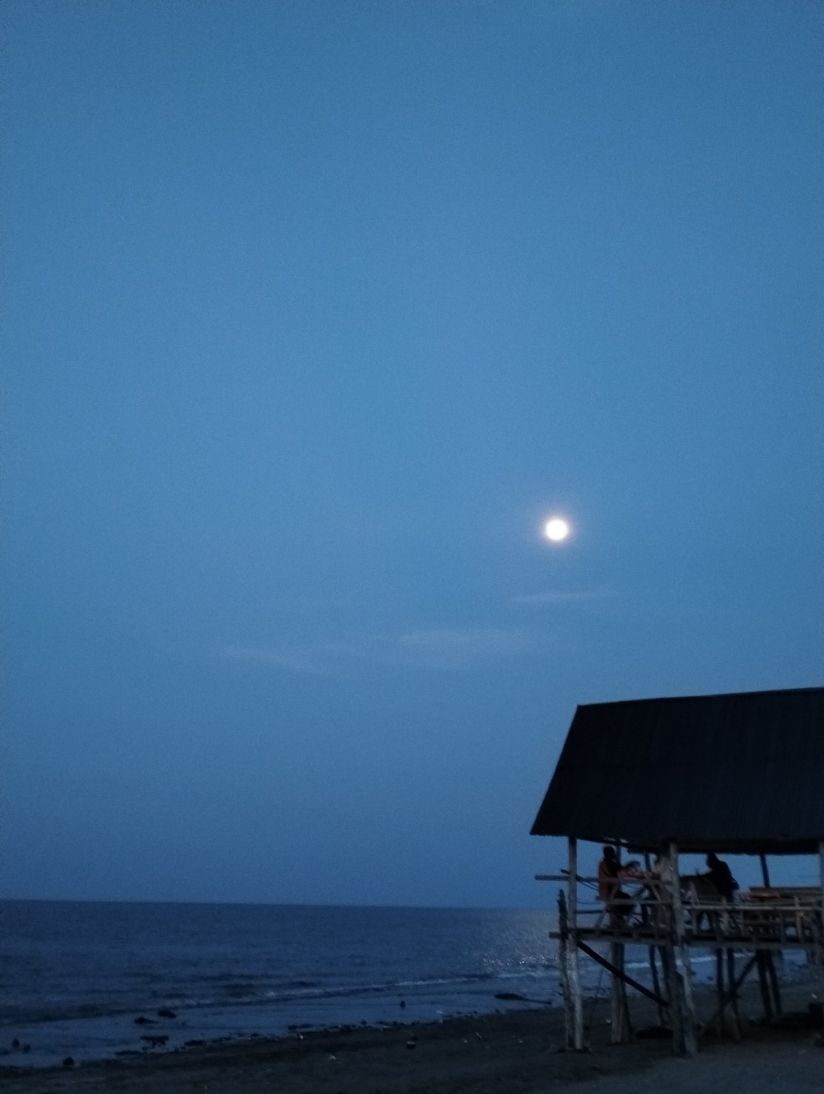 Twilight coastal scenes documented in Lhokseumawe, Indonesia