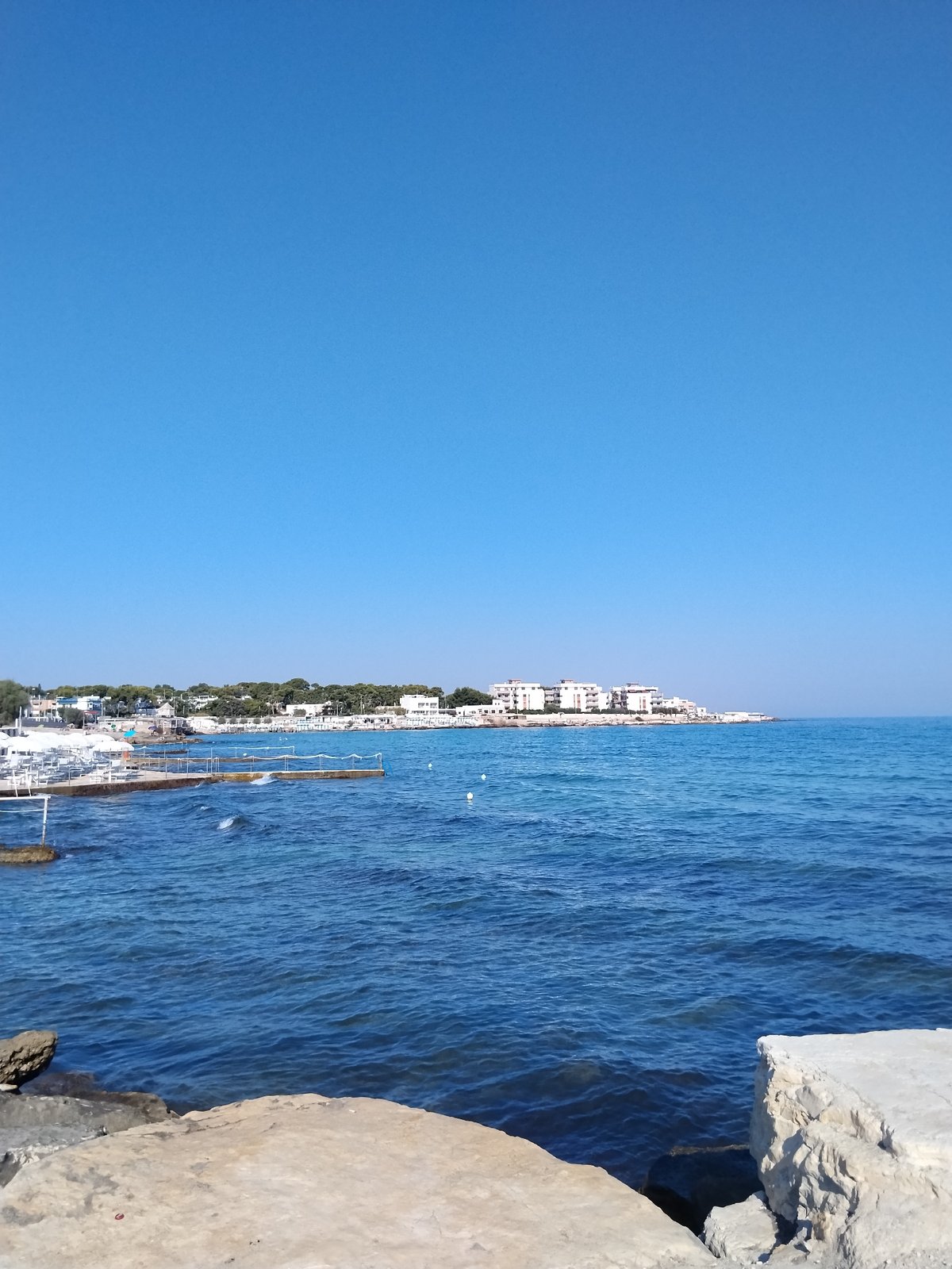 Rocky Adriatic shoreline and street scenes in Bari