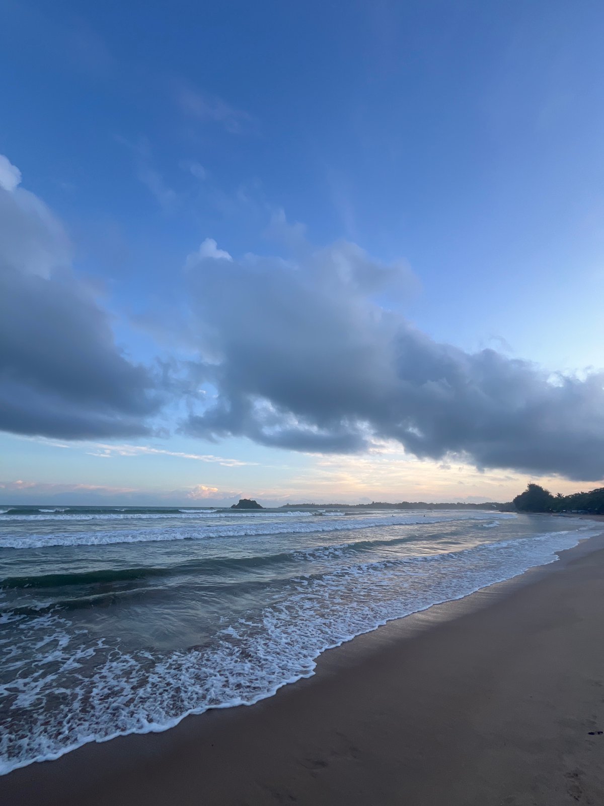 Serene beach scenes documented at dusk in Peleana, Sri Lanka