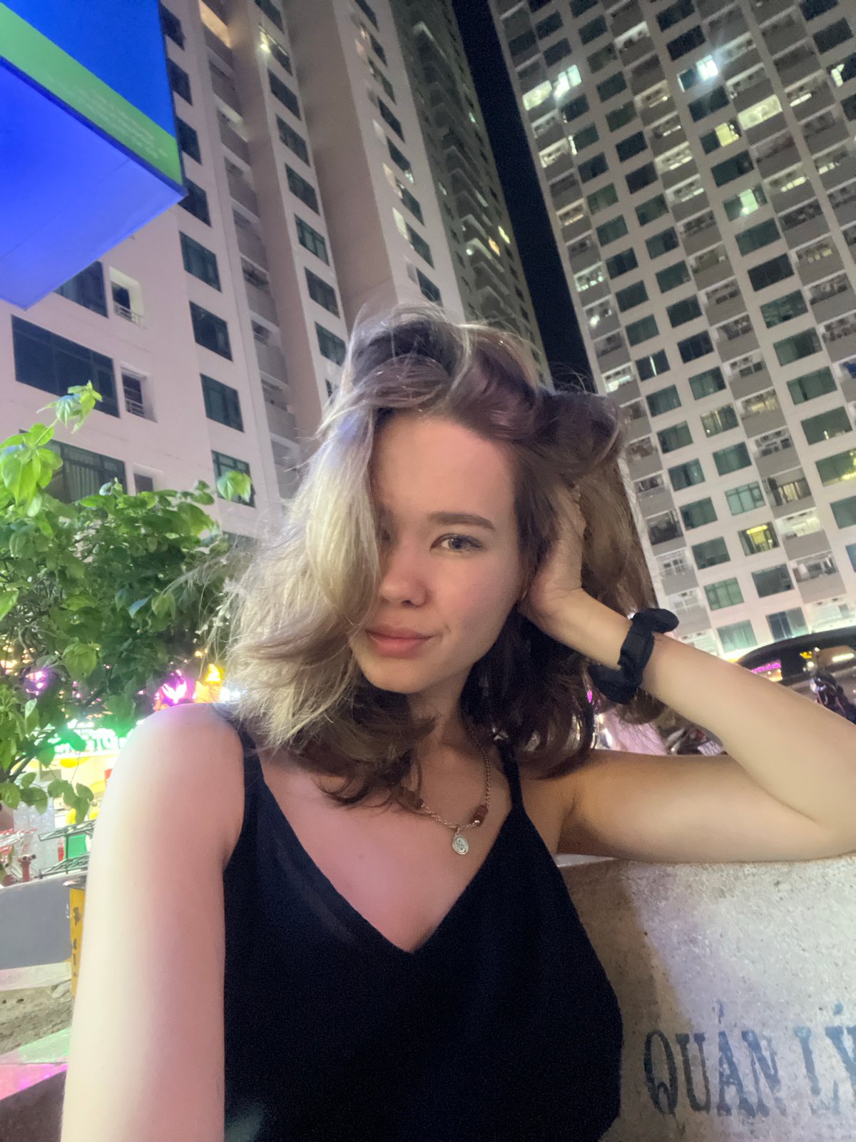 Woman takes selfie in Bắc Nha Trang, Vietnam