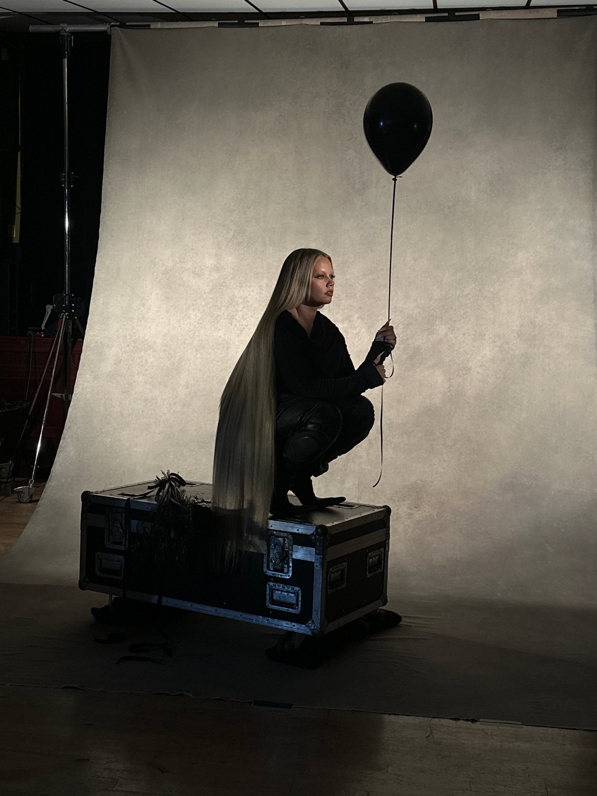 Photography studio session captures woman with balloon in London