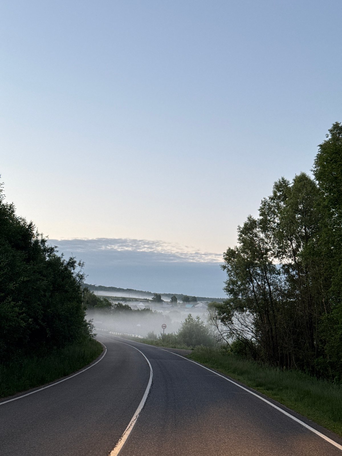 Dawn road scene documented in Уральское, Russia