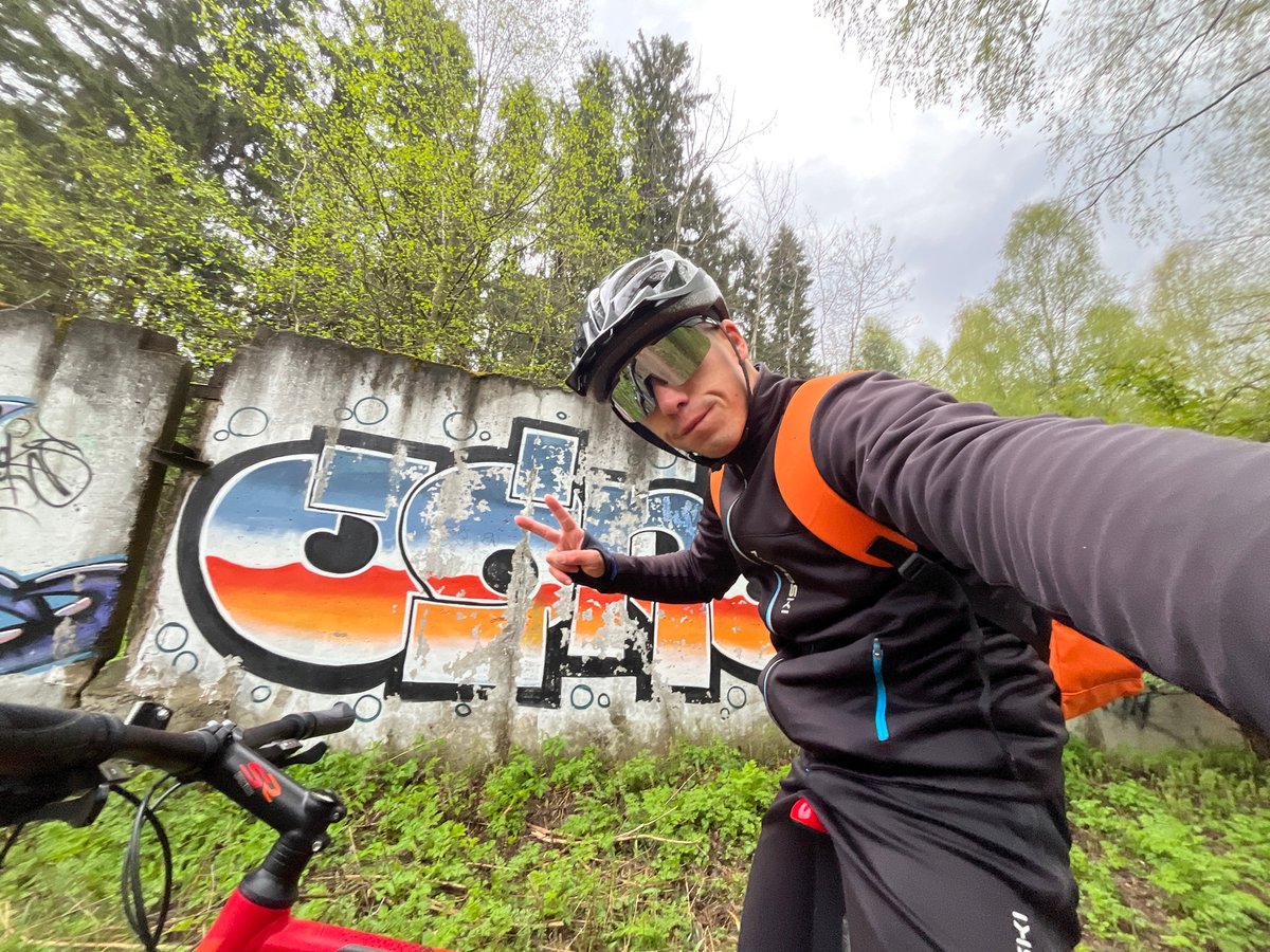 Cyclist takes selfies during early morning mountain bike ride