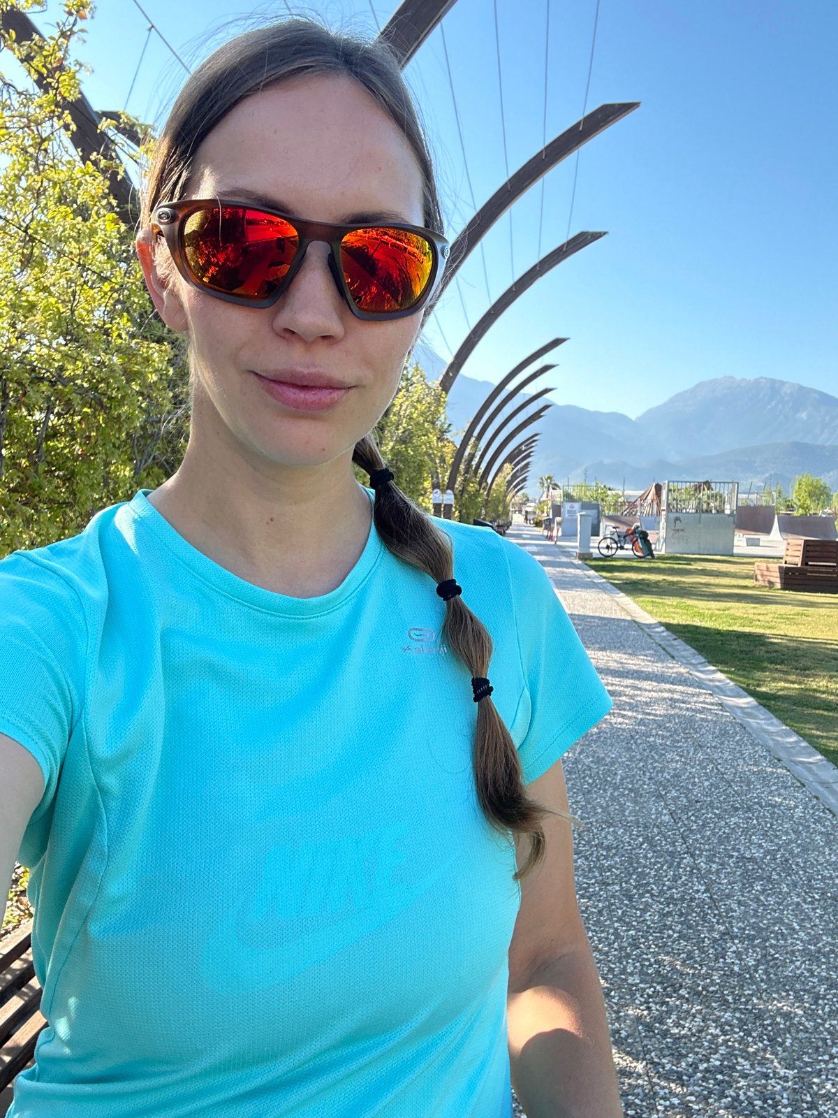 Woman exercises outdoors in Turkish resort town early morning
