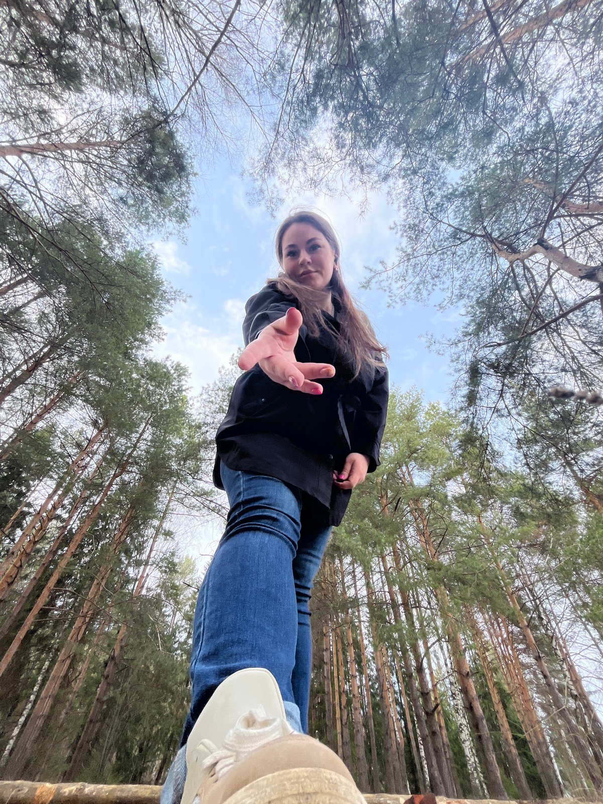 Woman explores spring forests near Chaikovsky, Russia