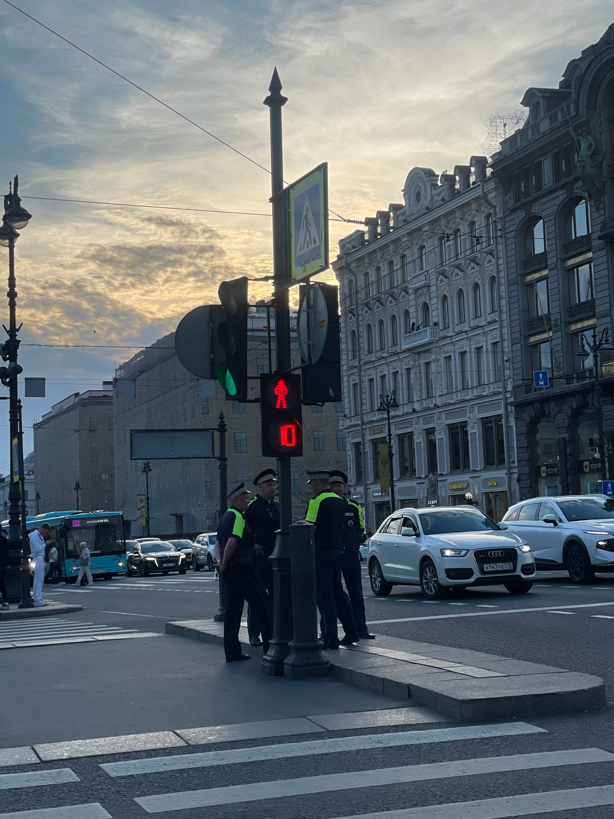 Evening street life documented across central Saint Petersburg landmarks