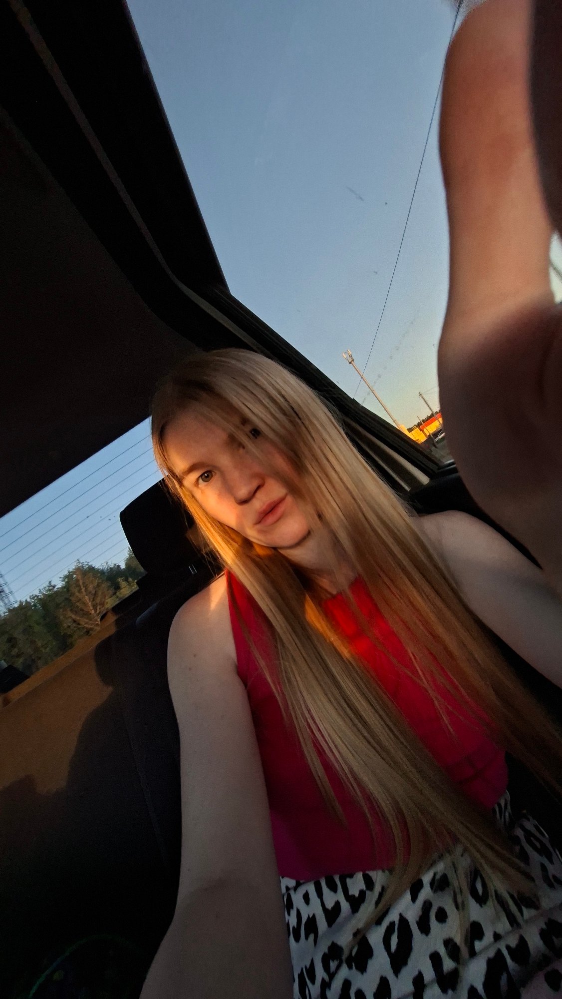 Woman documents car journey with selfie near Chaikovsky, Russia