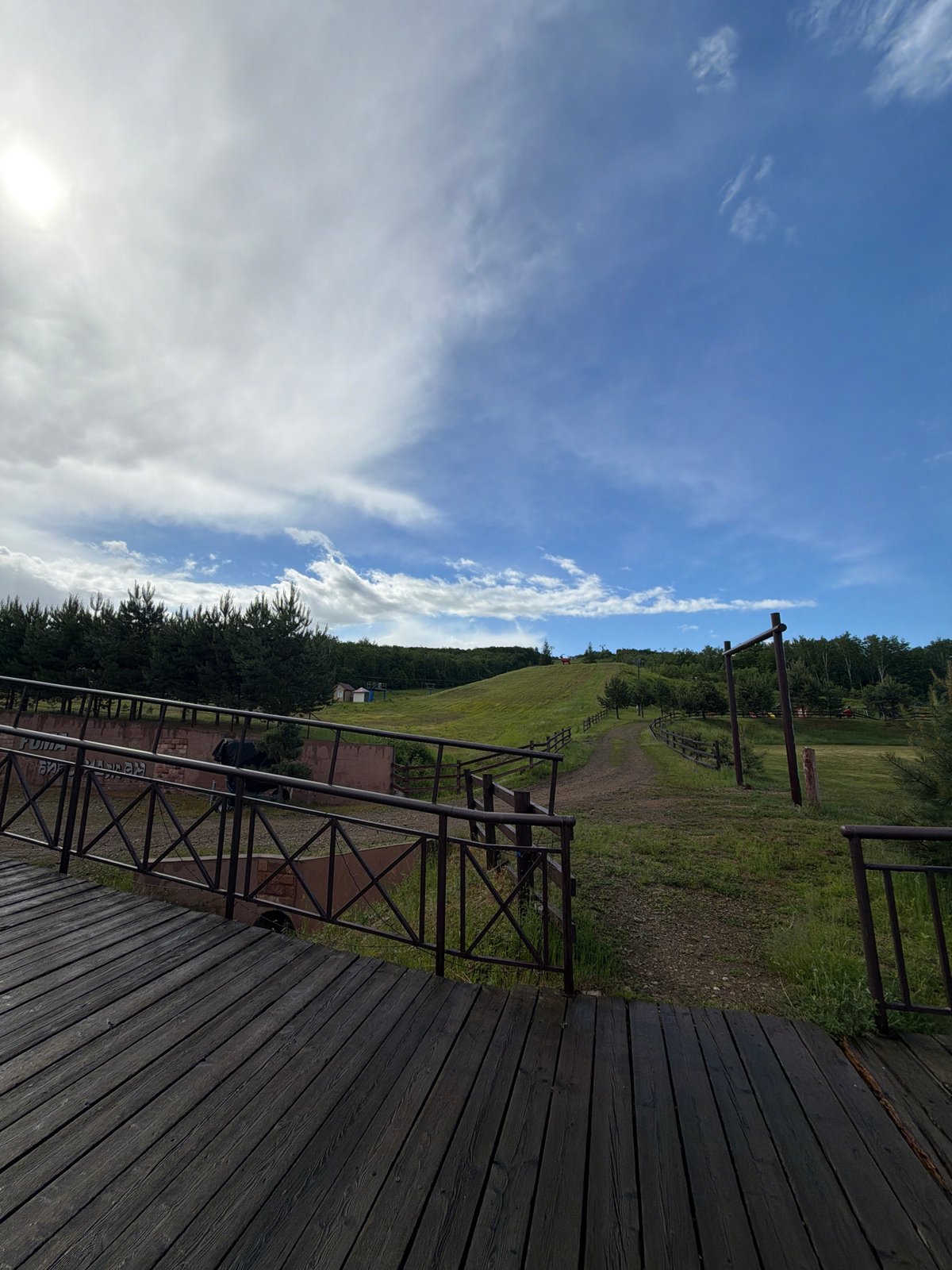 Selfies on wooden platform overlooking Birobidzhan countryside