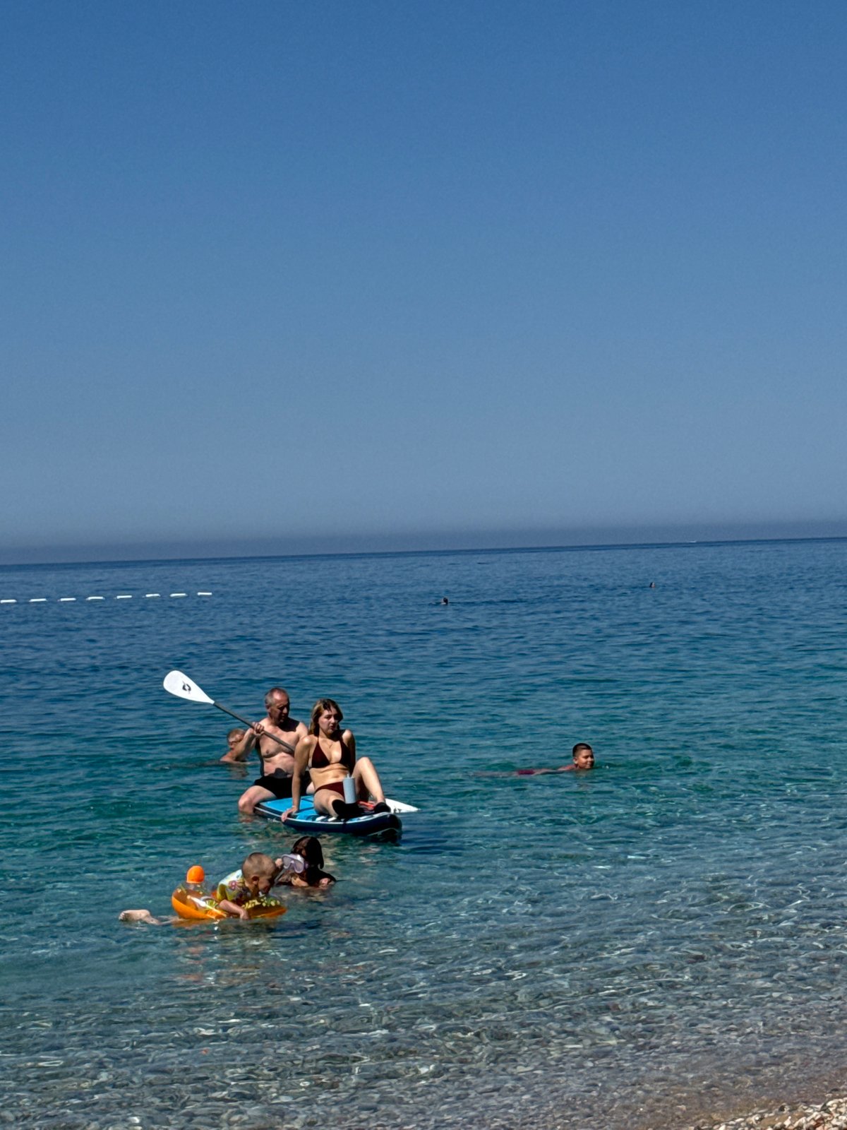 Summer beach day at Mirište's rocky Adriatic coves, Montenegro